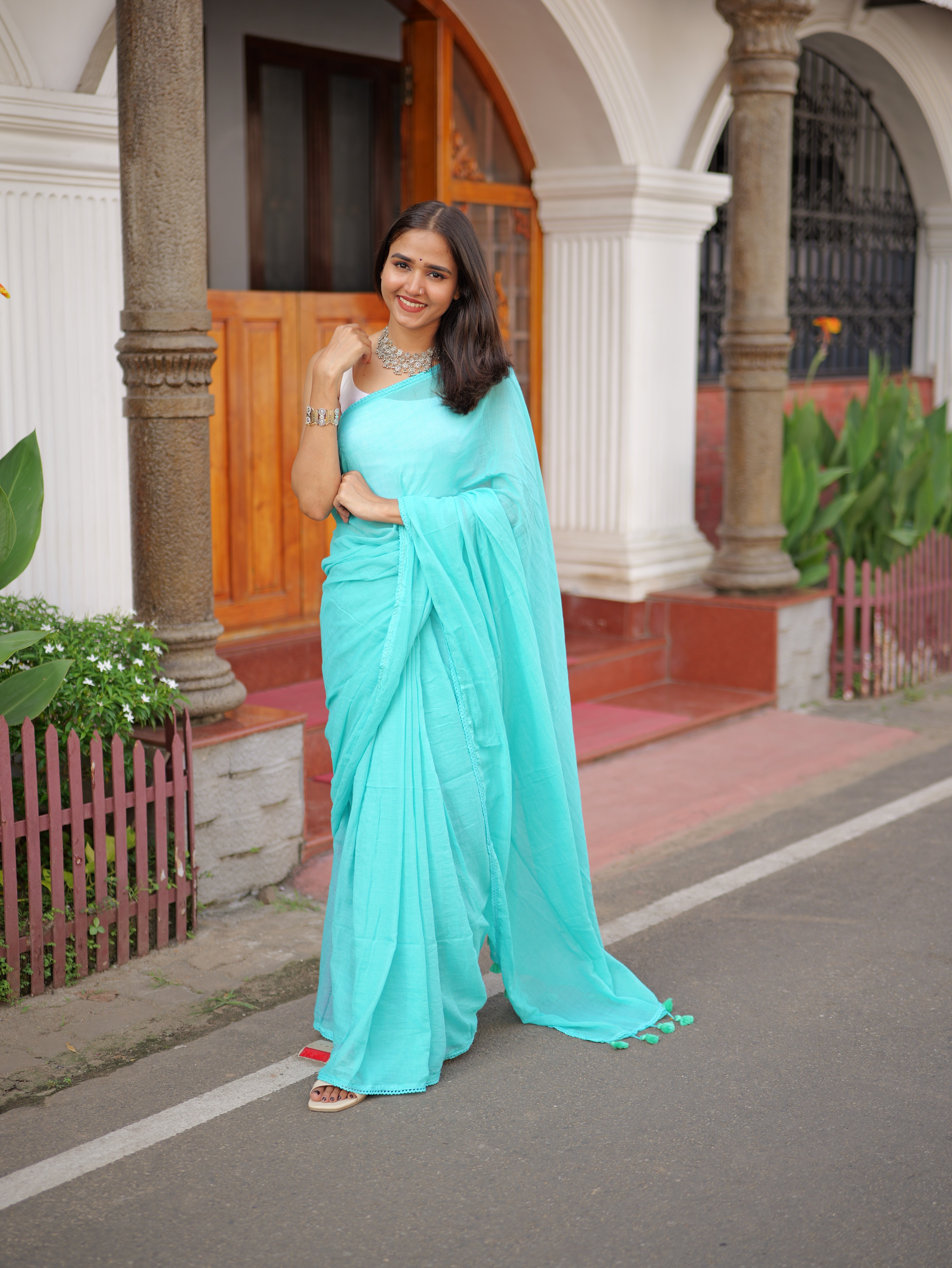 Skyblue mulmul cotton saree with embroidered lace border