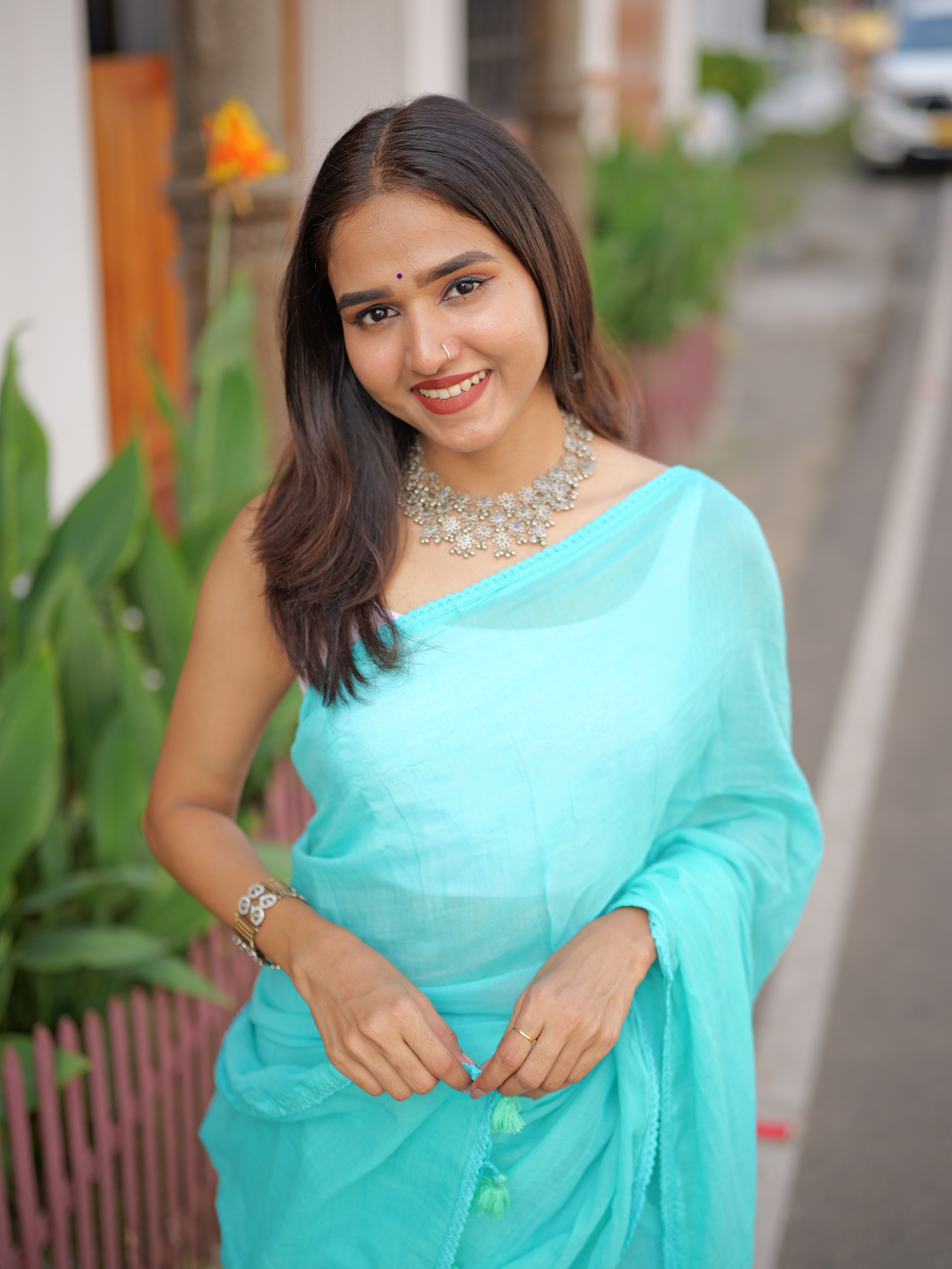 Skyblue mulmul cotton saree with embroidered lace border