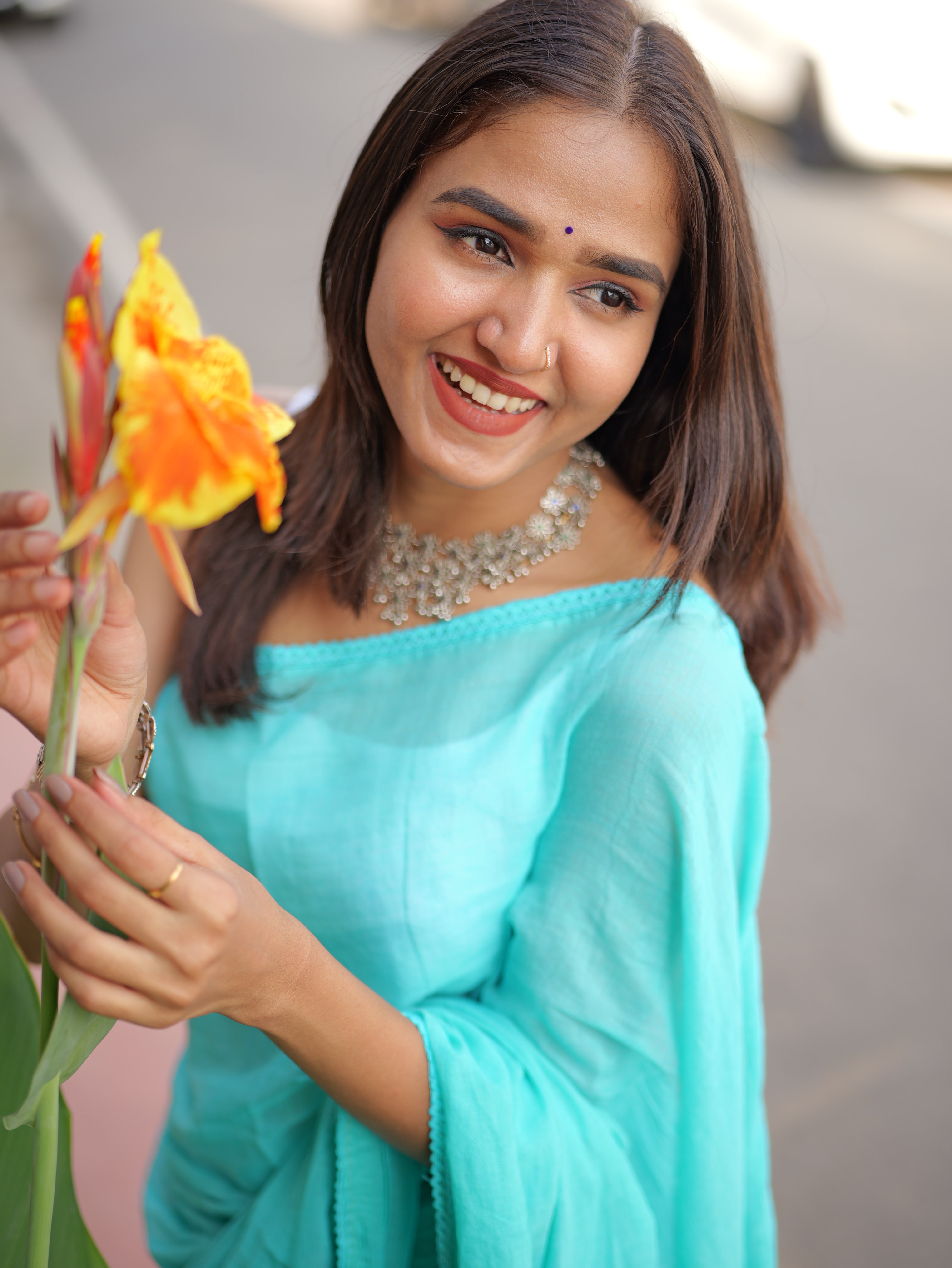 Skyblue mulmul cotton saree with embroidered lace border