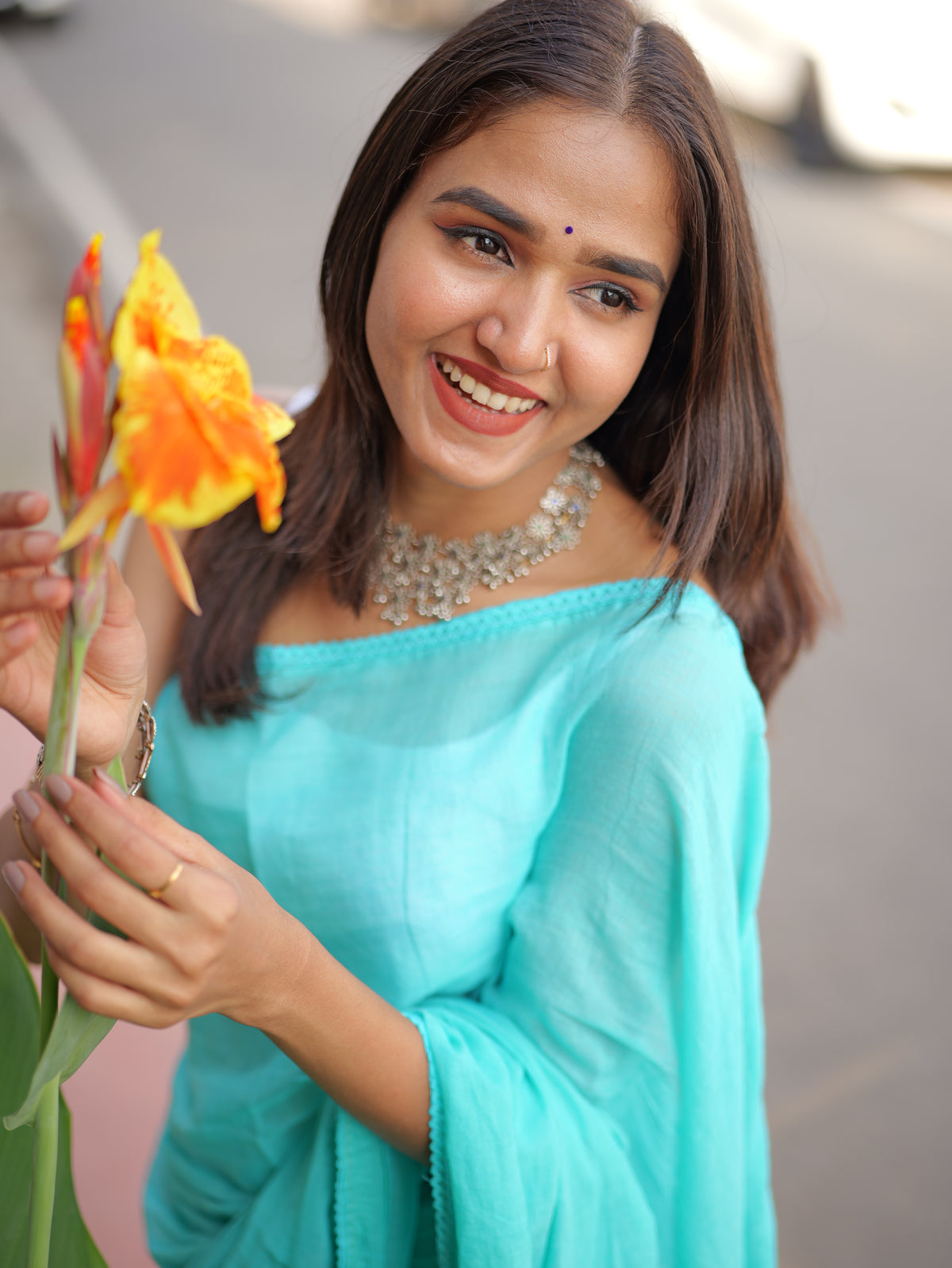 Skyblue mulmul cotton saree with embroidered lace border