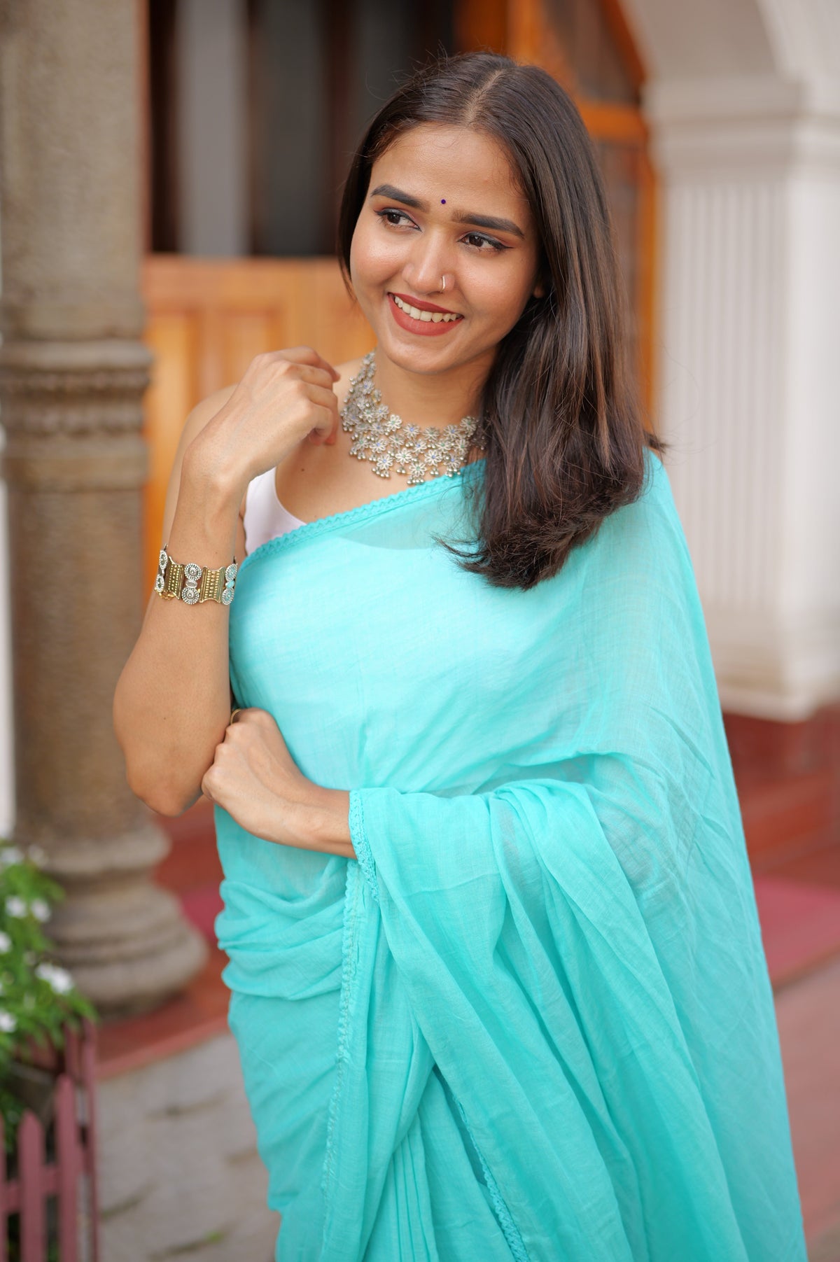 Skyblue mulmul cotton saree with embroidered lace border