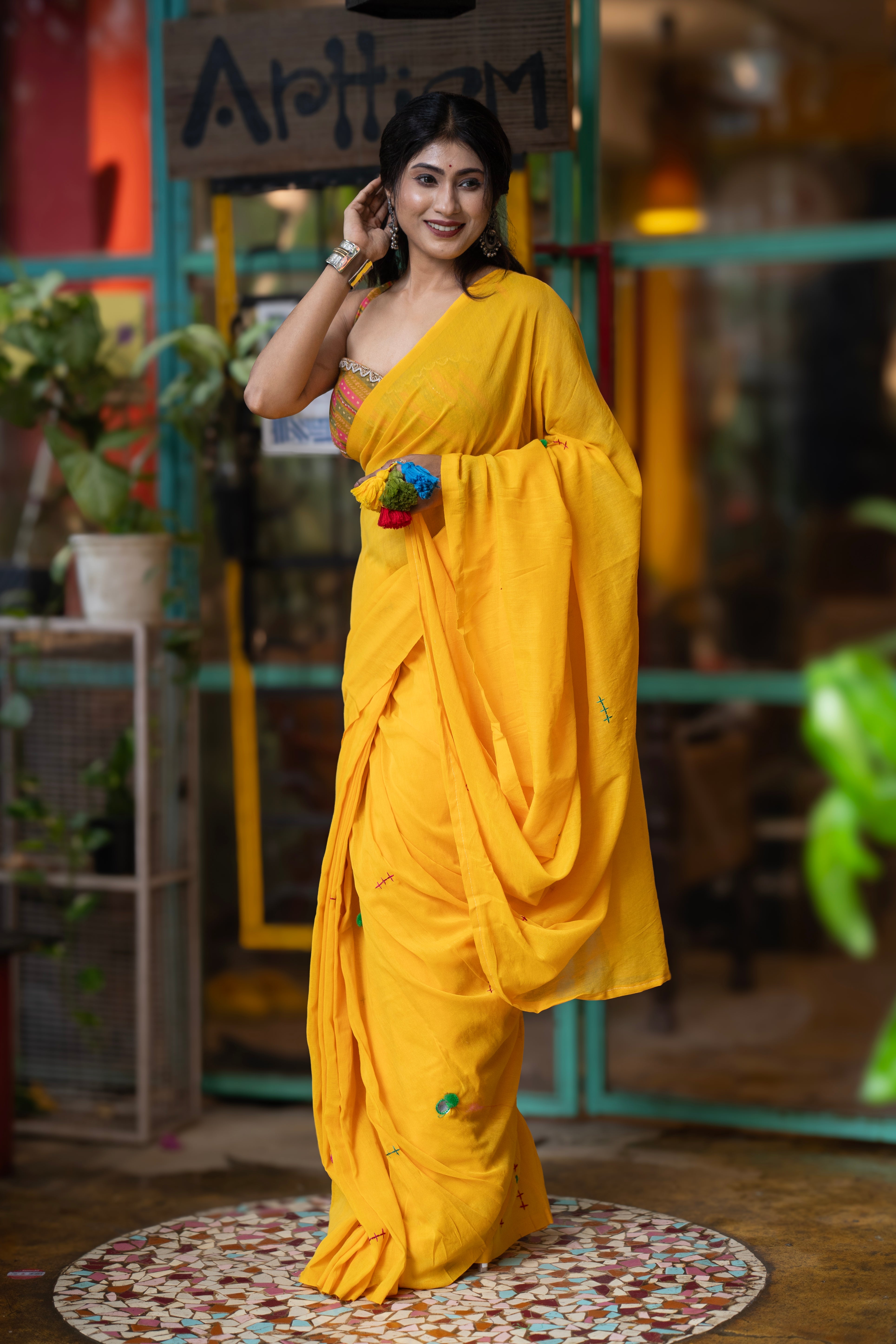 Yellow mul Cotton Saree with Mirror Work & Pompom Border