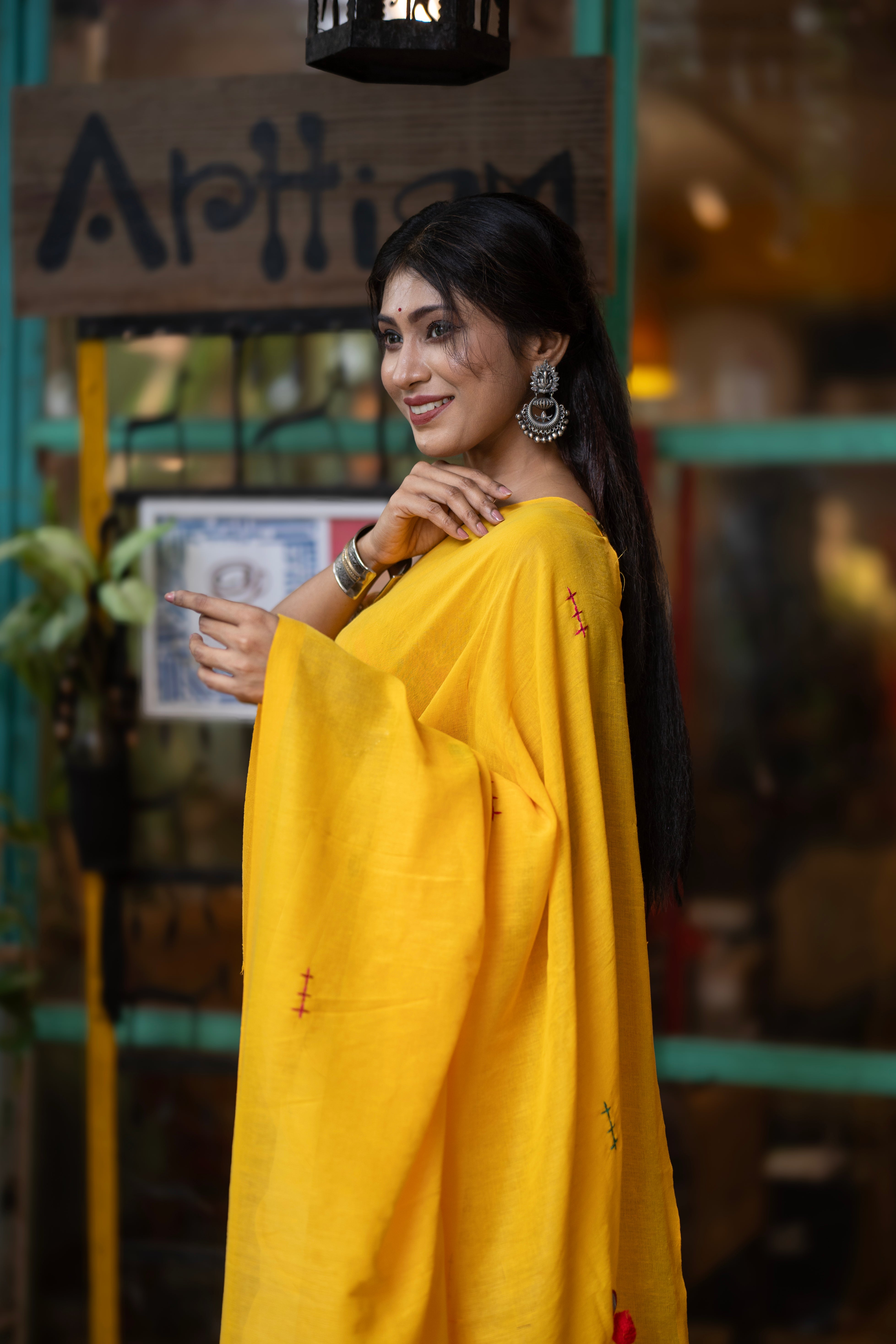 Yellow mul Cotton Saree with Mirror Work & Pompom Border
