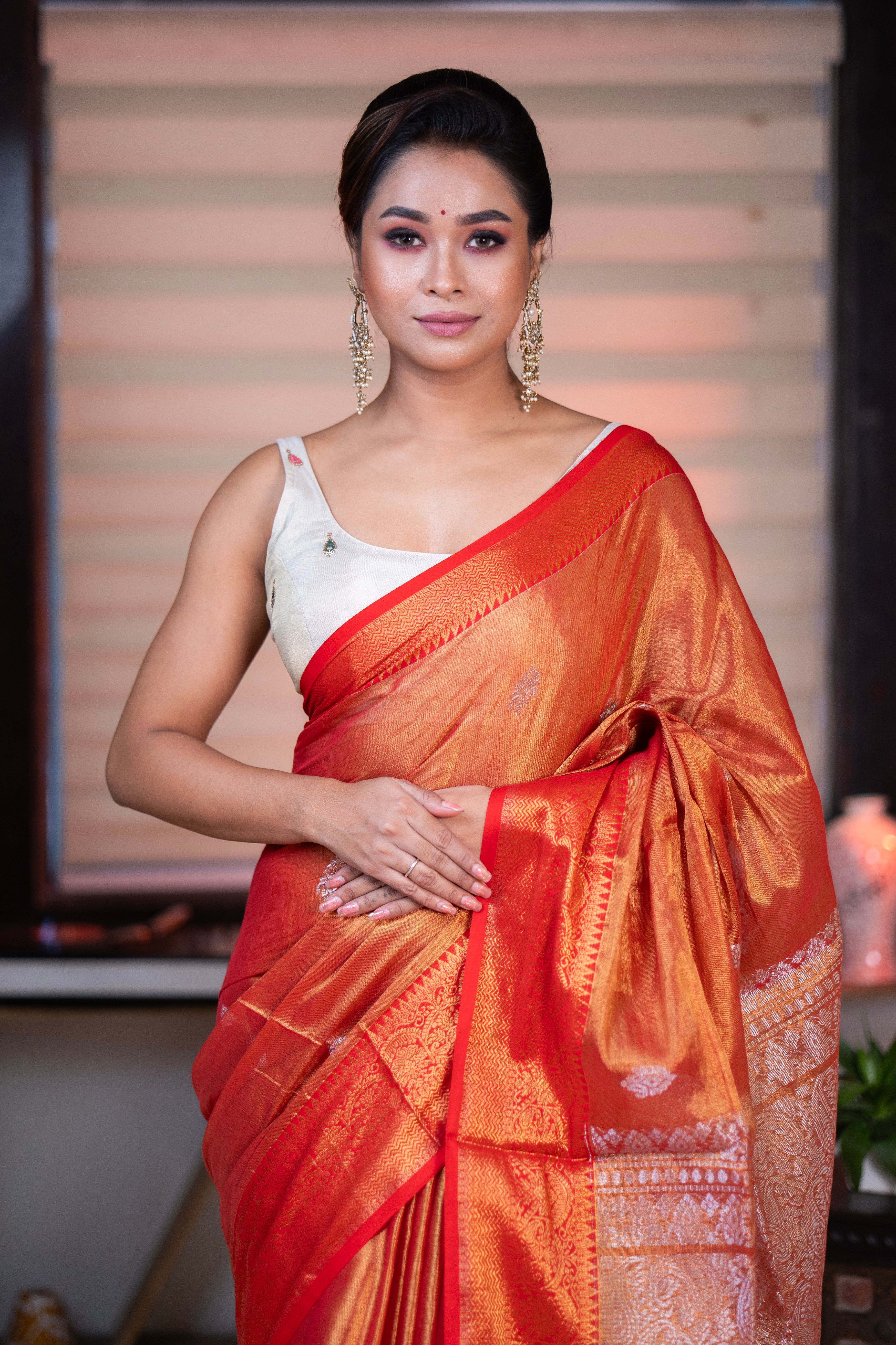 Metallic Orange dual tone Tissue Linen Handwoven Saree