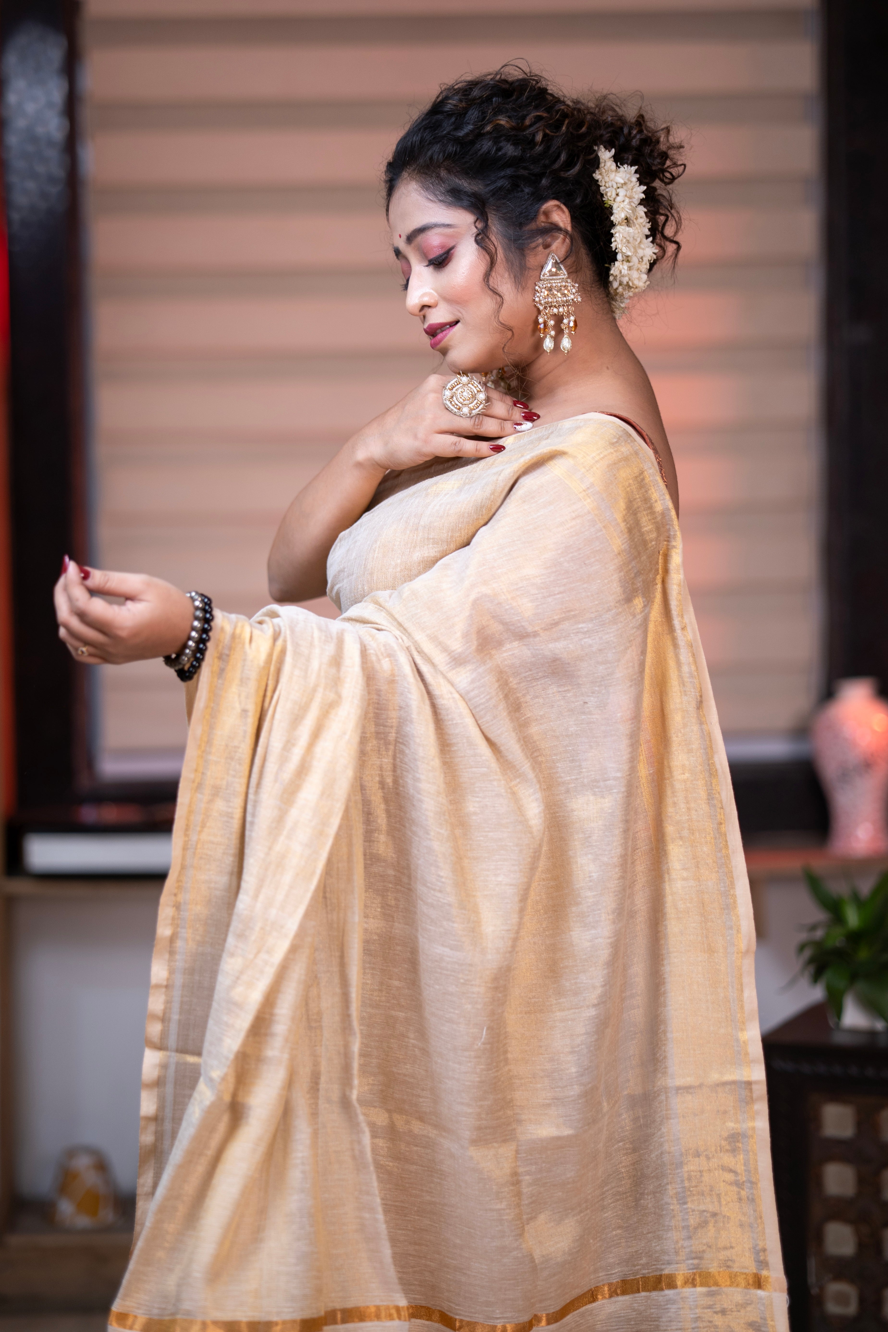 Golden dual tone pure tissue linen saree