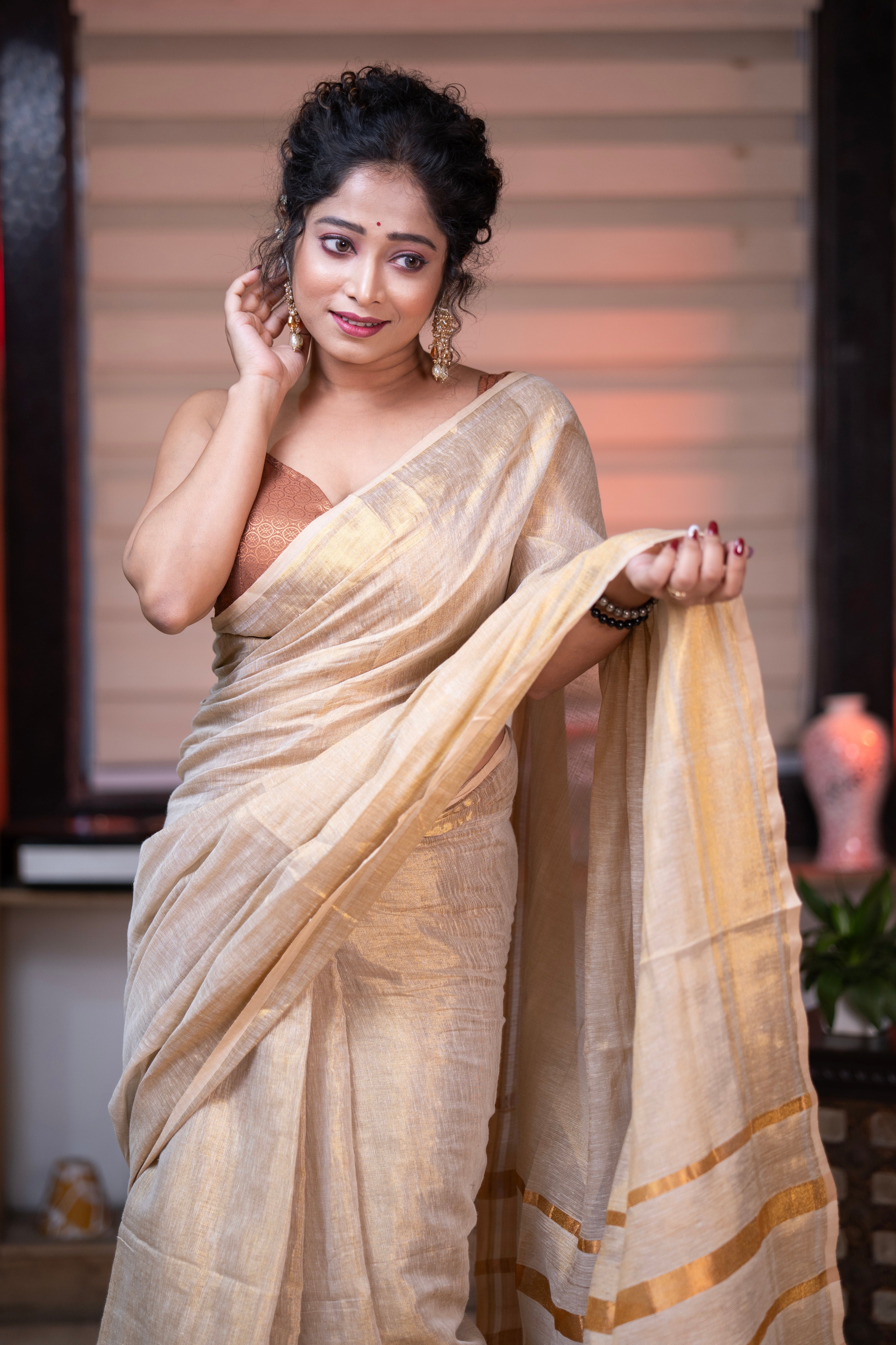 Golden dual tone pure tissue linen saree