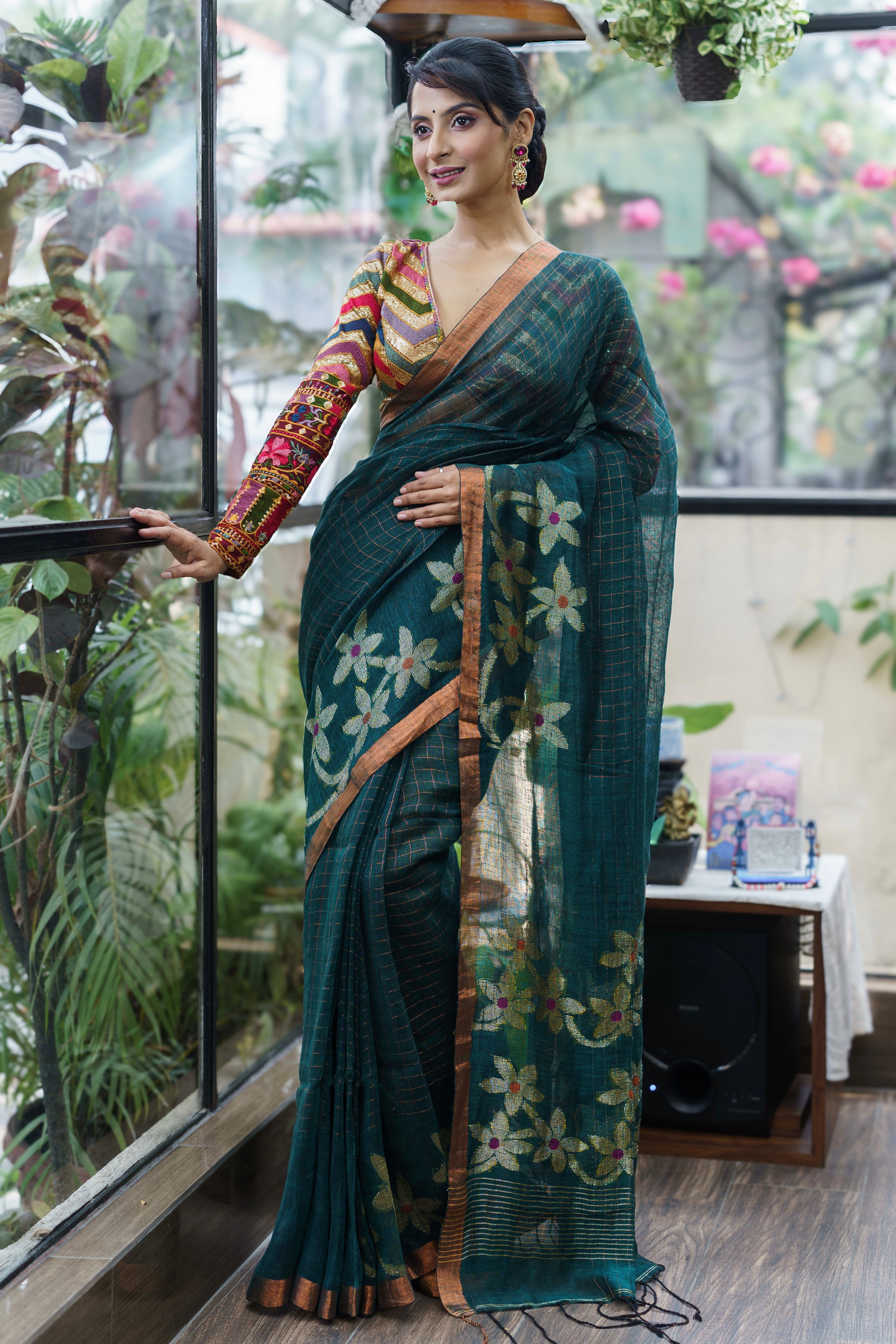 Forest Green Handwoven Linen Saree with Zari Checks & Floral Motifs