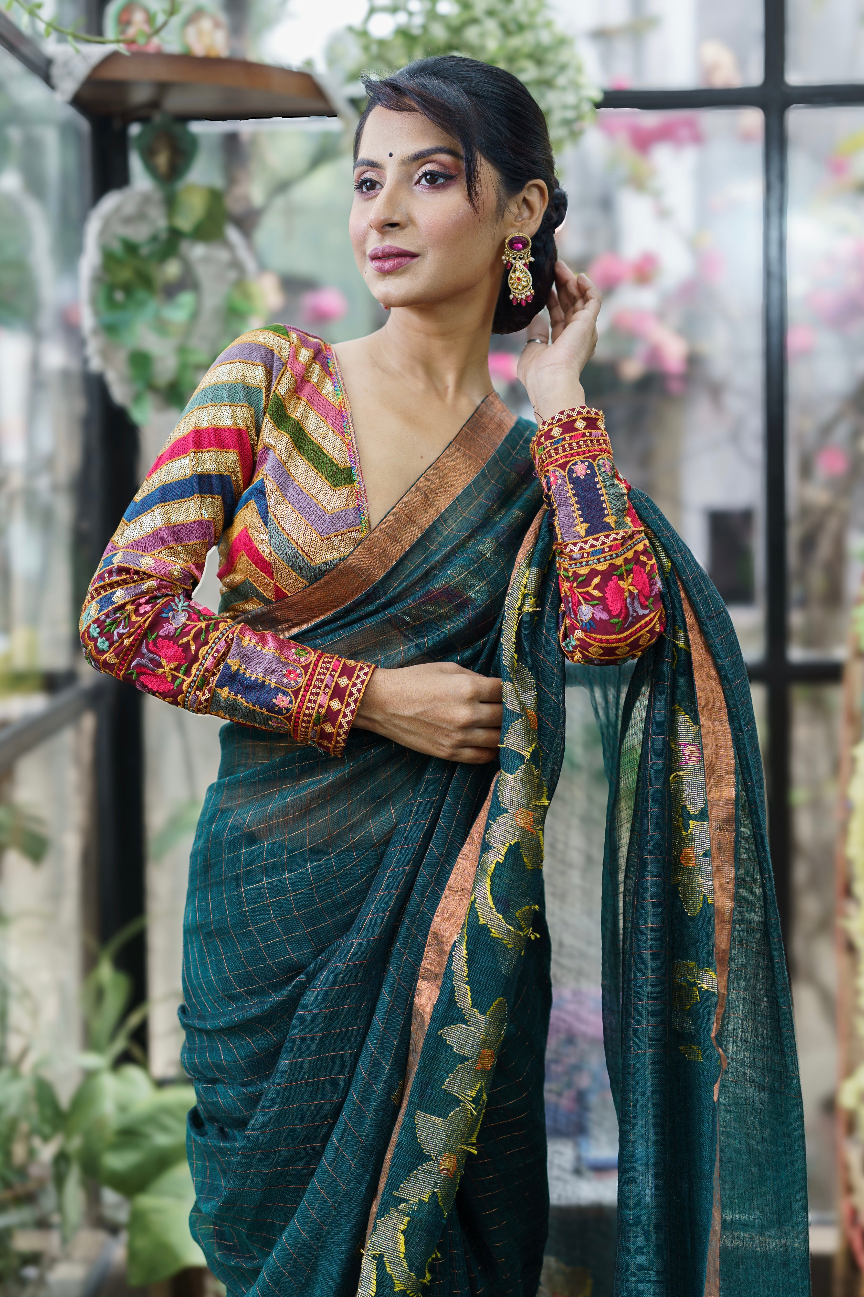 Forest Green Handwoven Linen Saree with Zari Checks & Floral Motifs