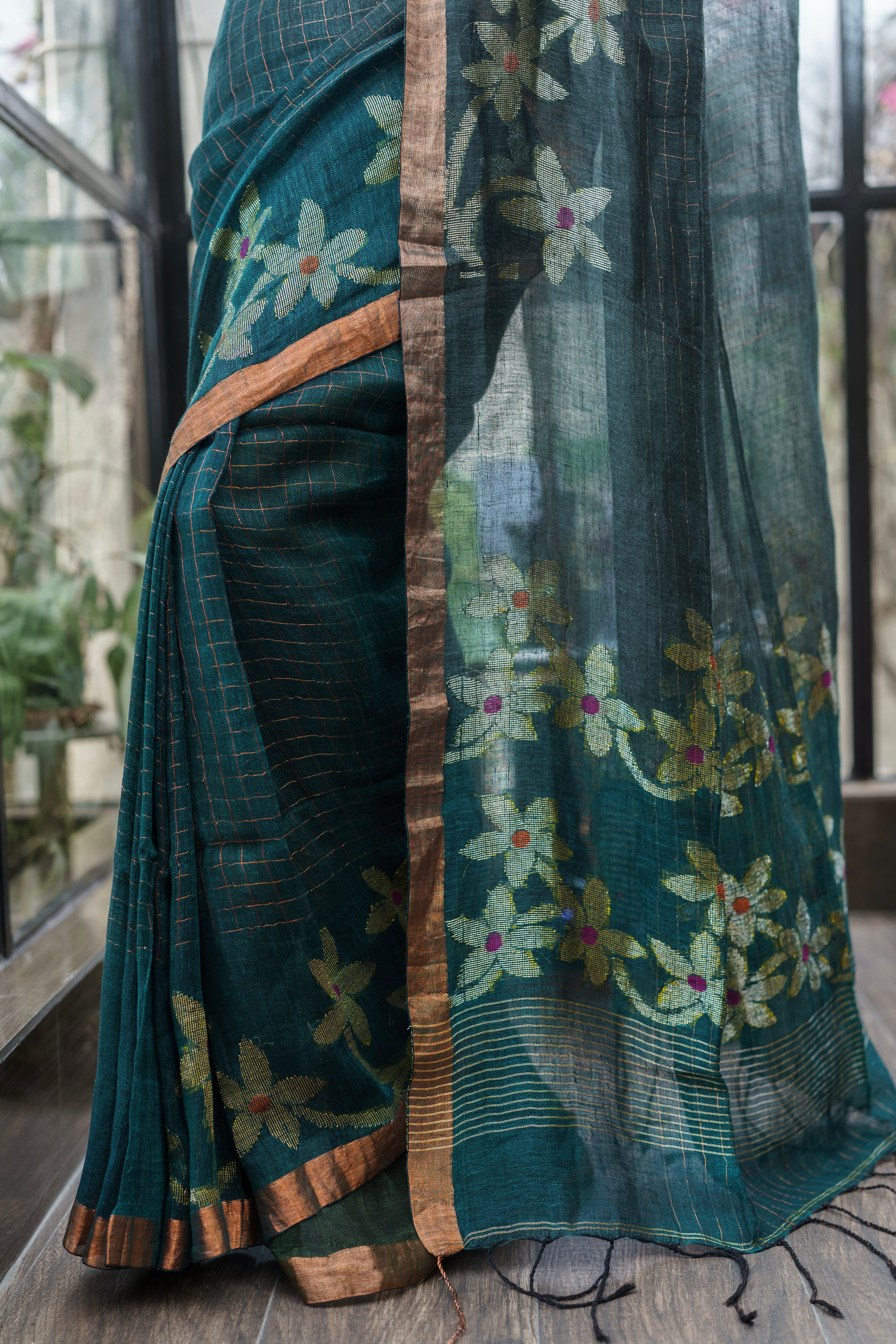 Forest Green Handwoven Linen Saree with Zari Checks & Floral Motifs