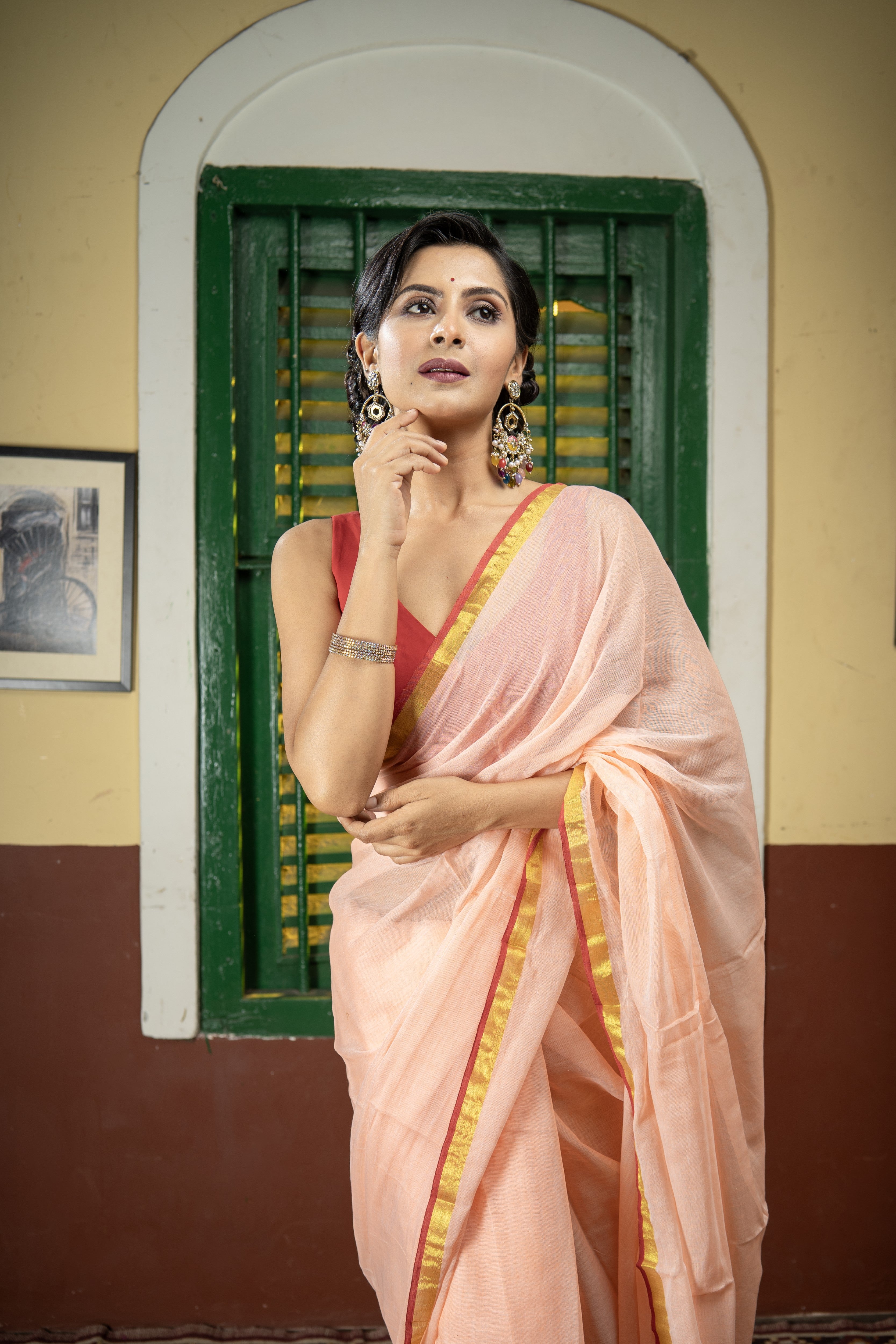 Peach Mul Mul Cotton Saree With Red Golden Border
