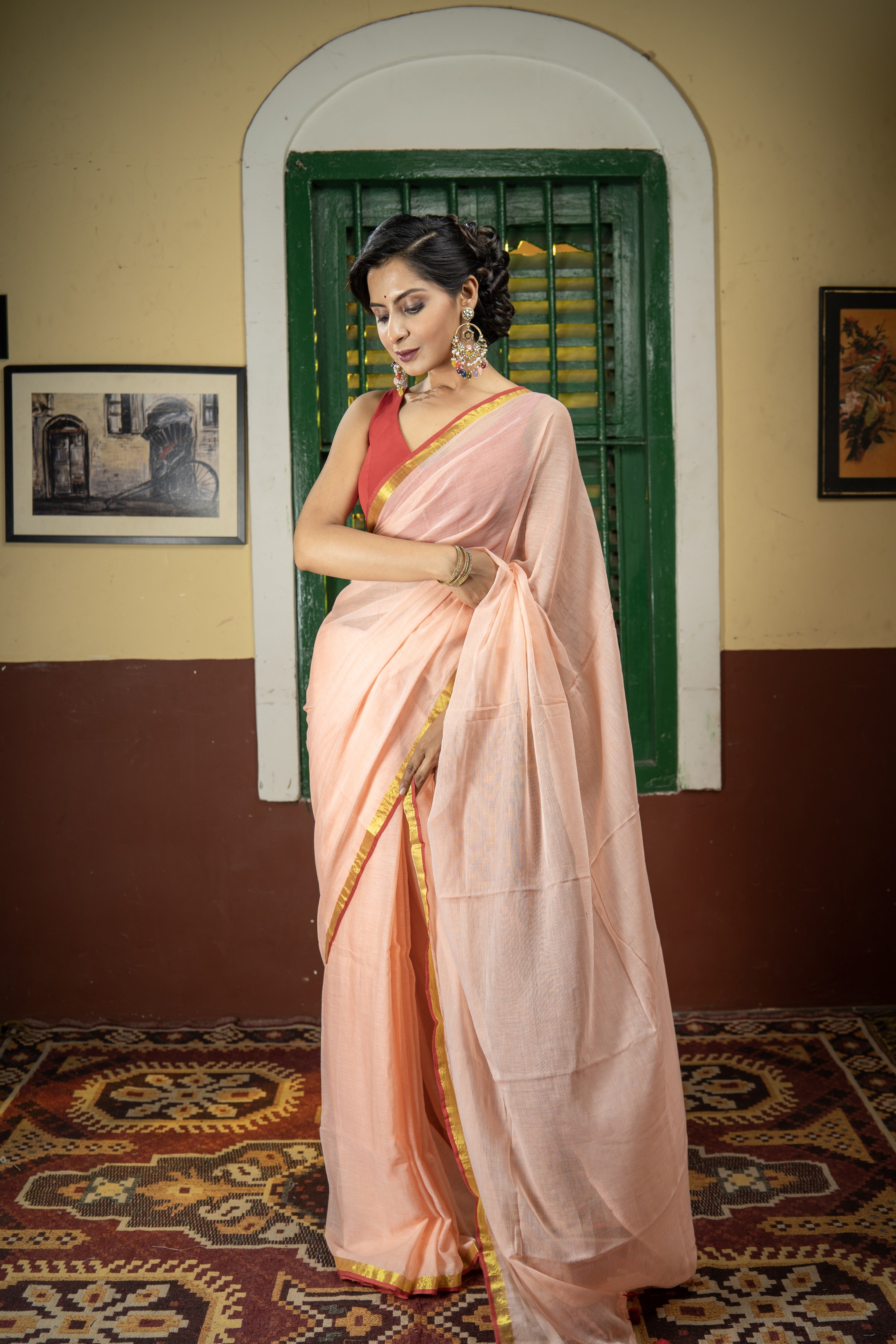 Peach Mul Mul Cotton Saree With Red Golden Border