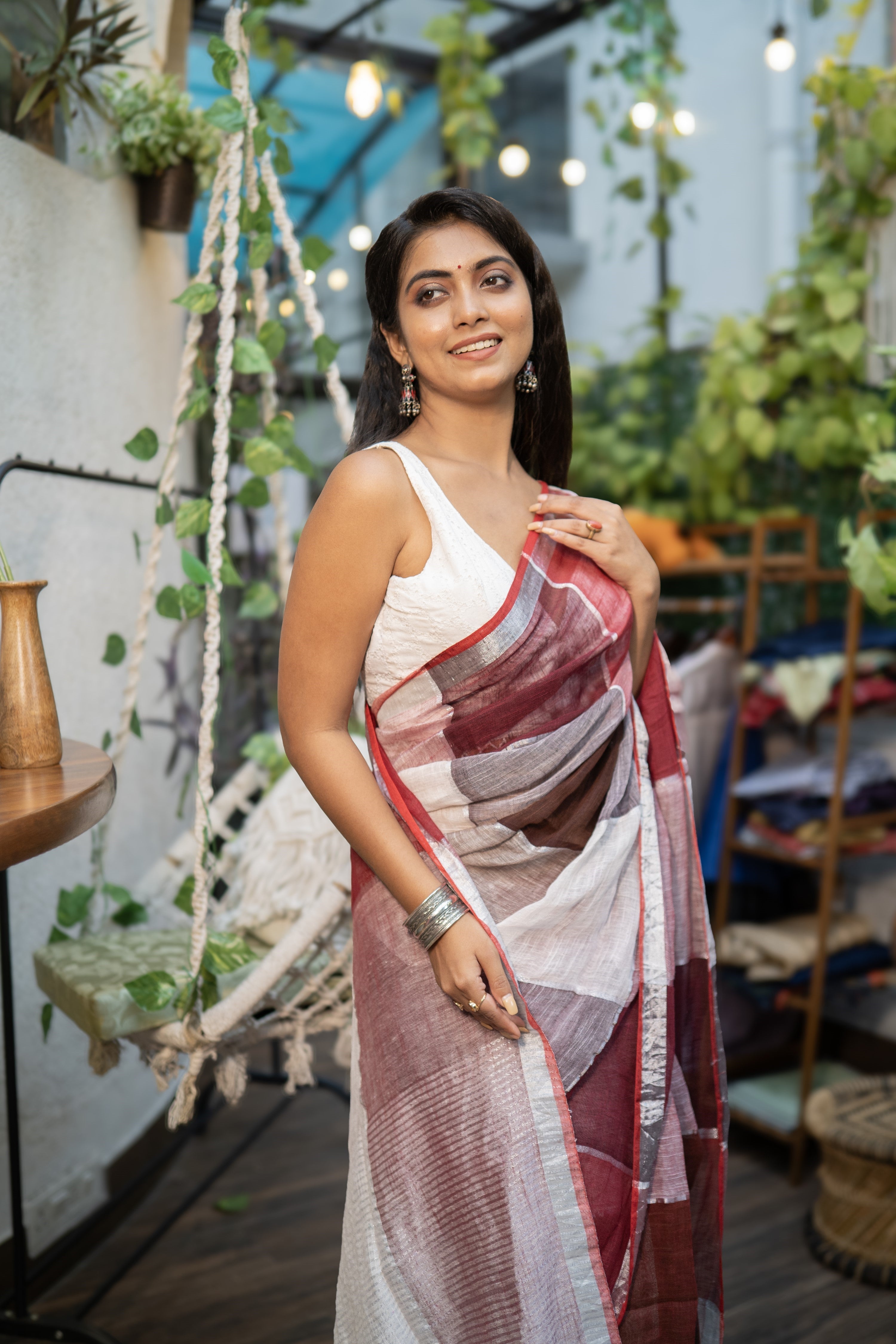 Maroon & red zari check linen saree
