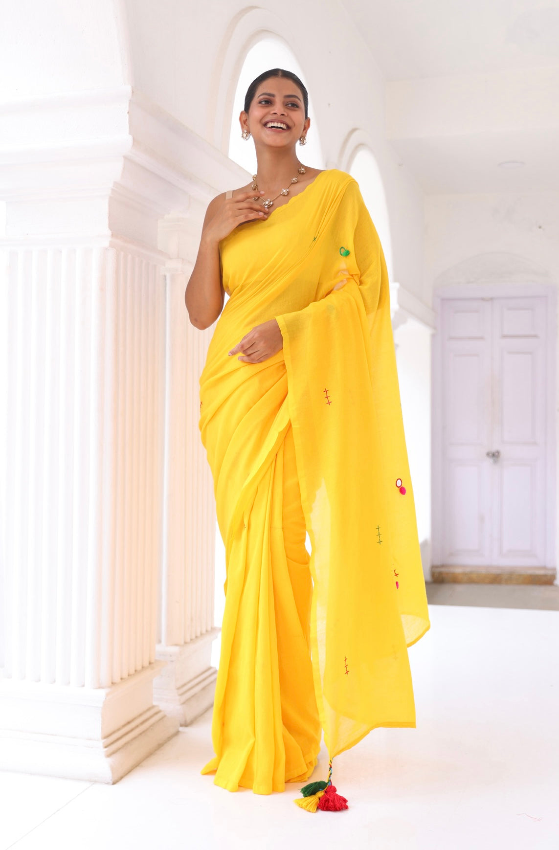 Yellow mul Cotton Saree with Mirror Work & Pompom Border