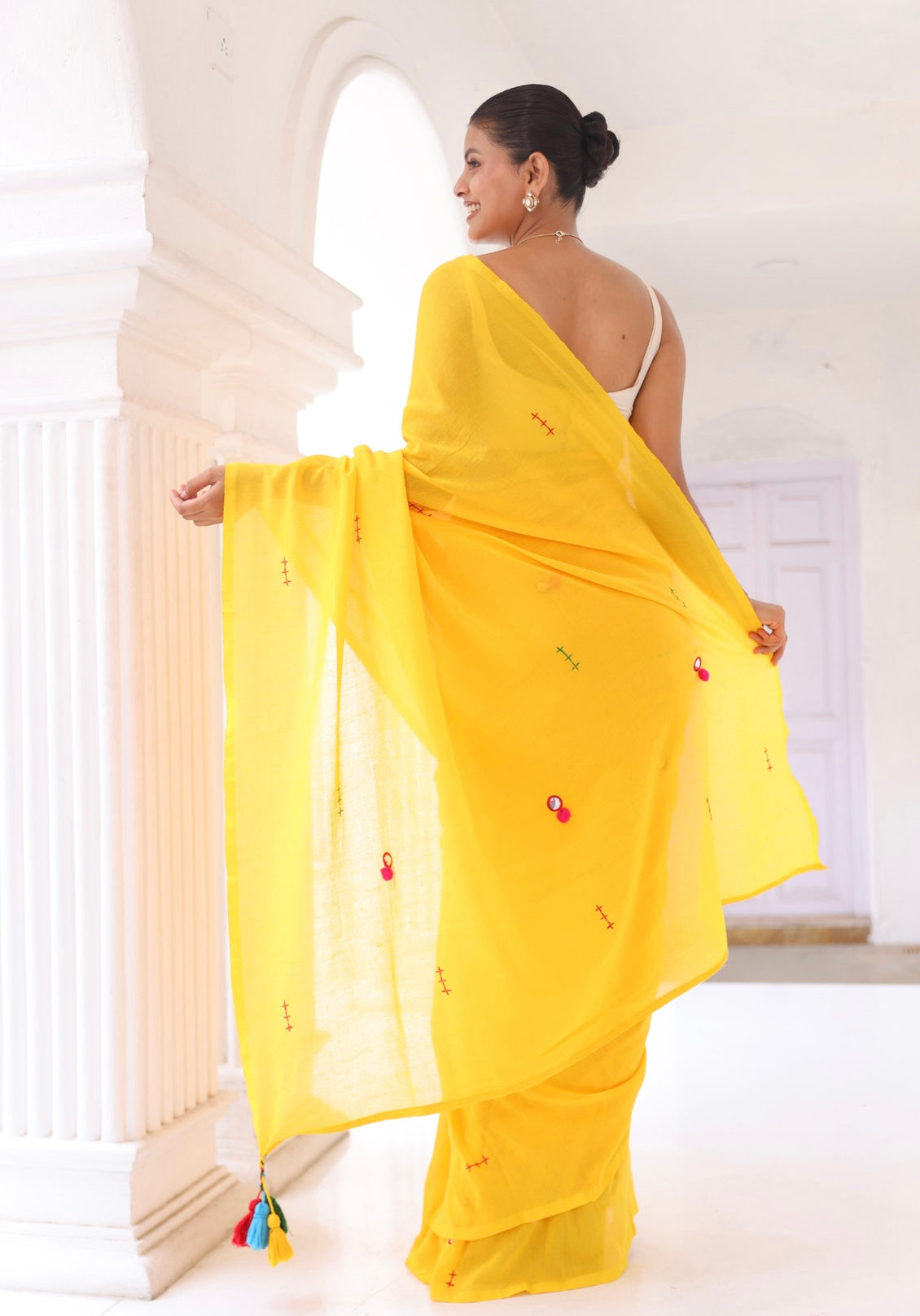 Yellow mul Cotton Saree with Mirror Work & Pompom Border