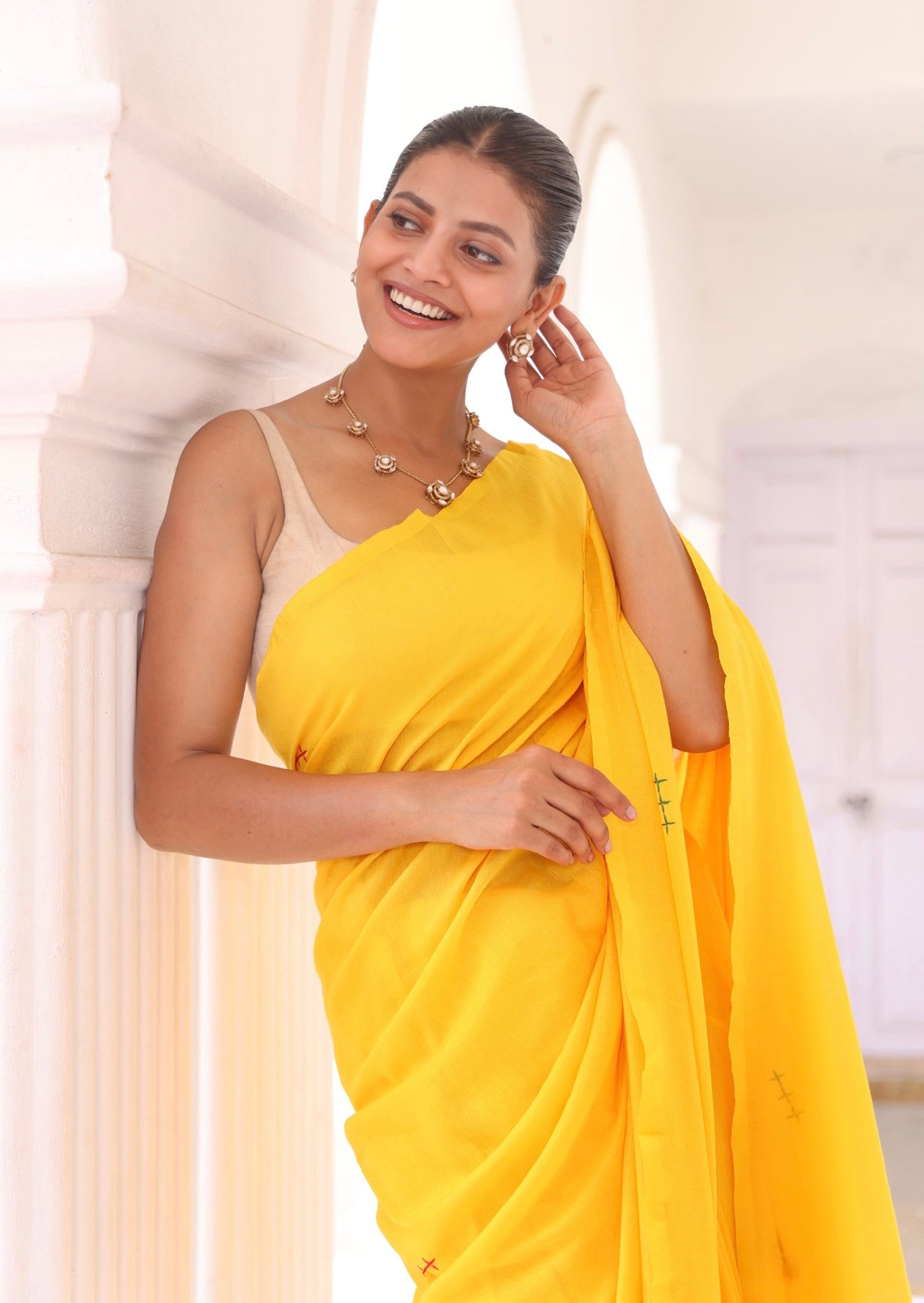 Yellow mul Cotton Saree with Mirror Work & Pompom Border