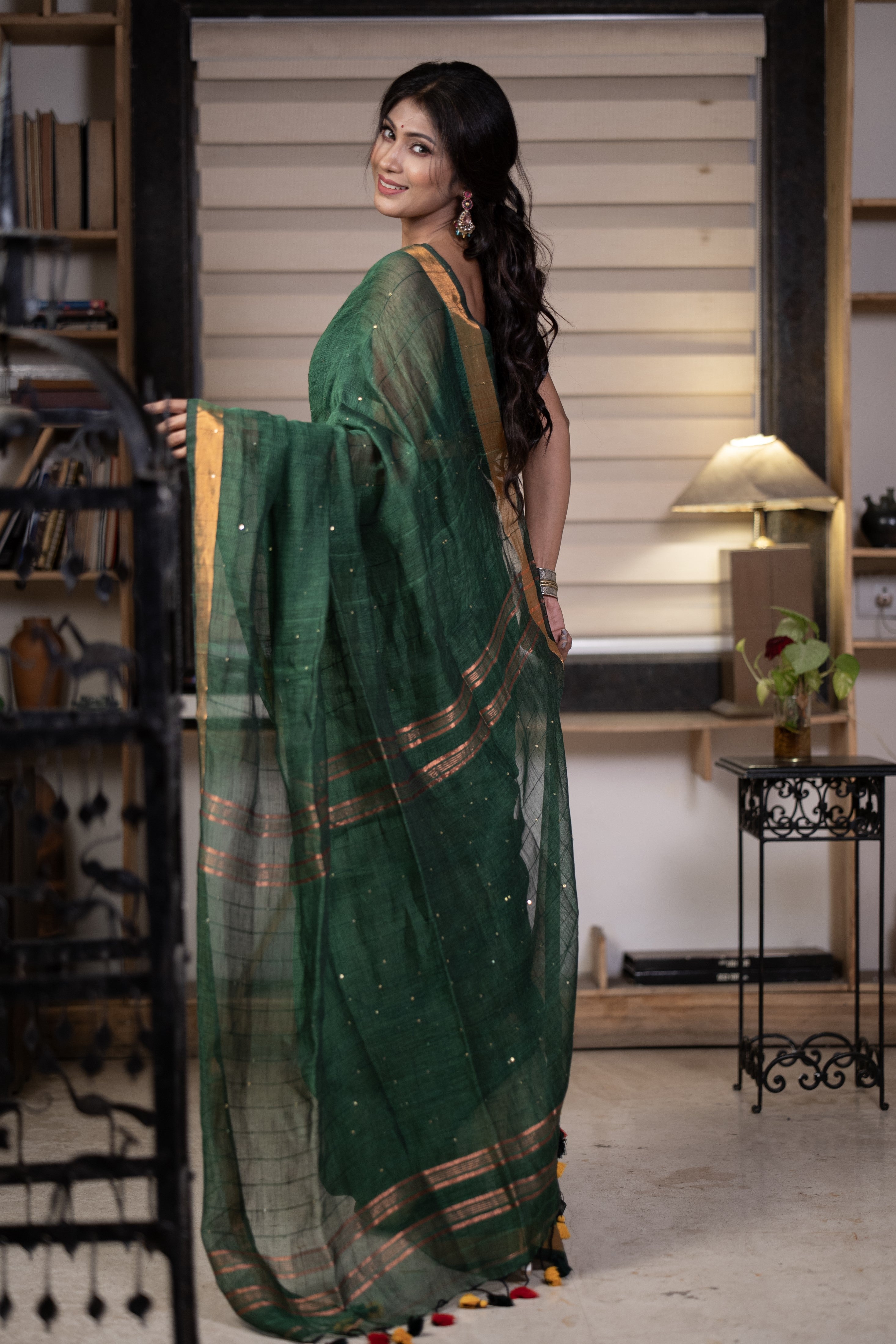 Dark green Sequence Work Linen Saree with golden zari border