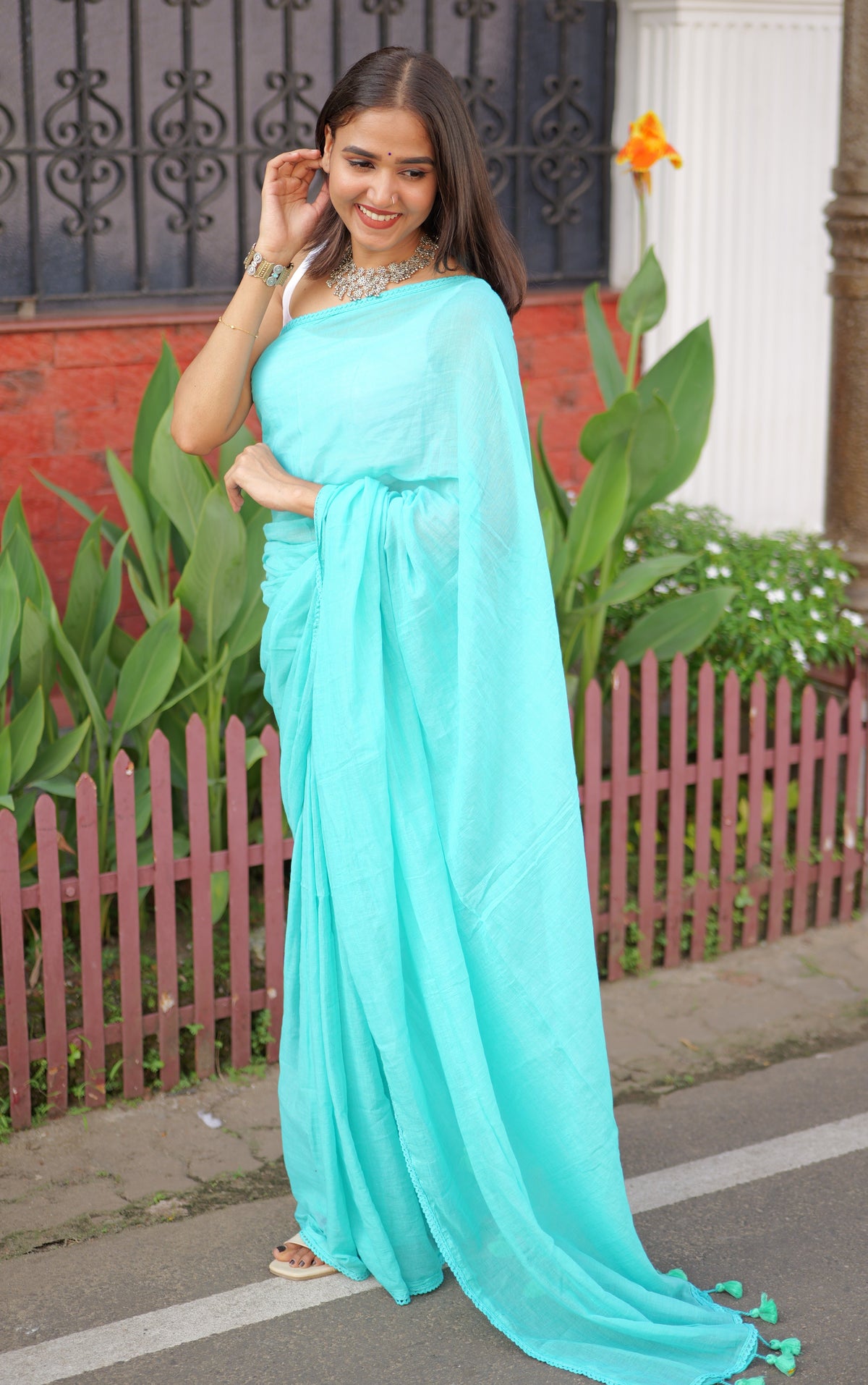Skyblue mulmul cotton saree with embroidered lace border