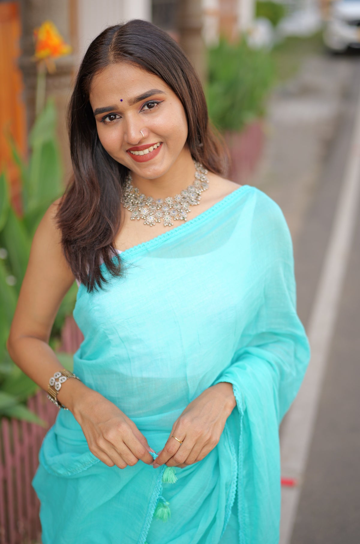 Skyblue mulmul cotton saree with embroidered lace border