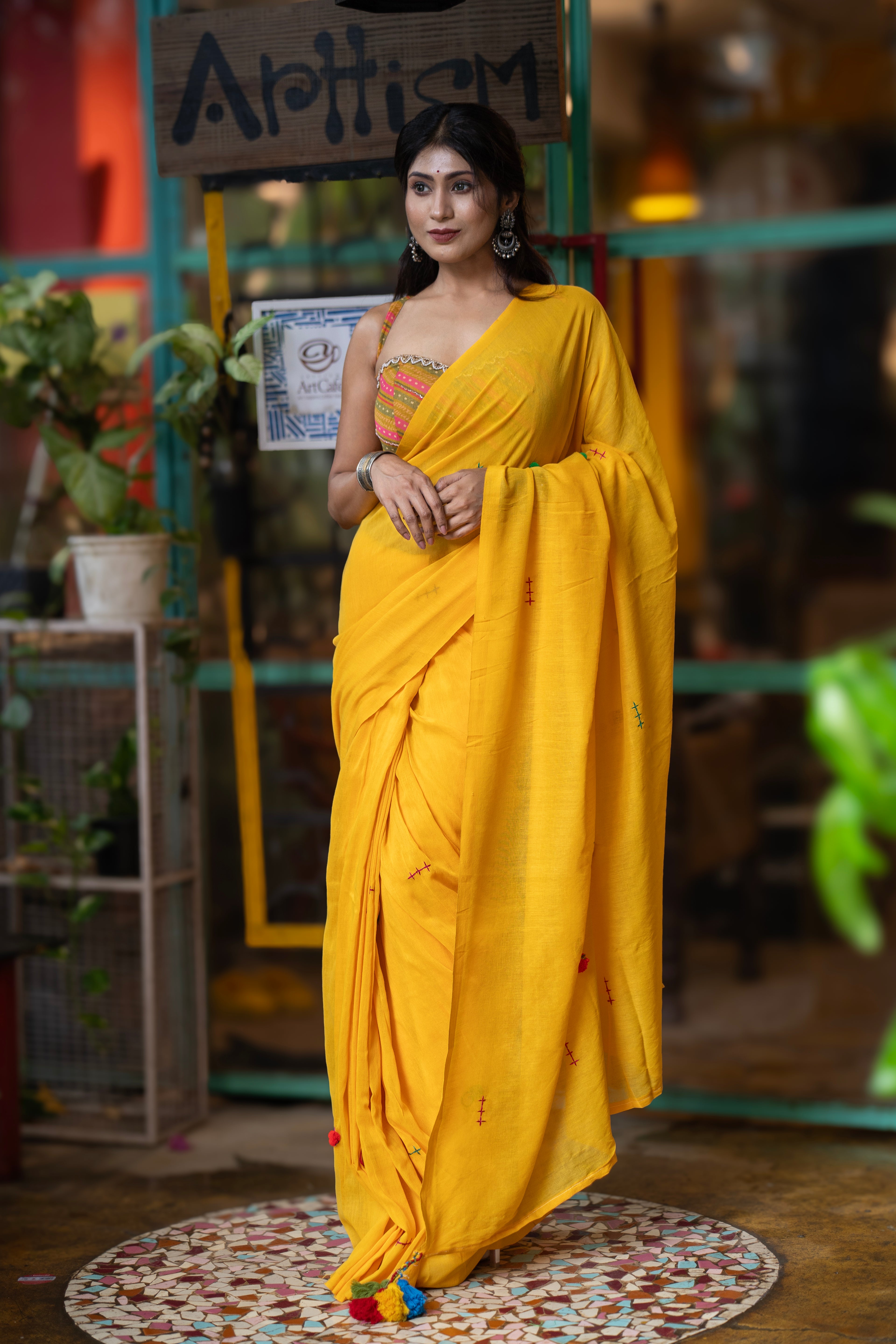 Yellow mul Cotton Saree with Mirror Work & Pompom Border