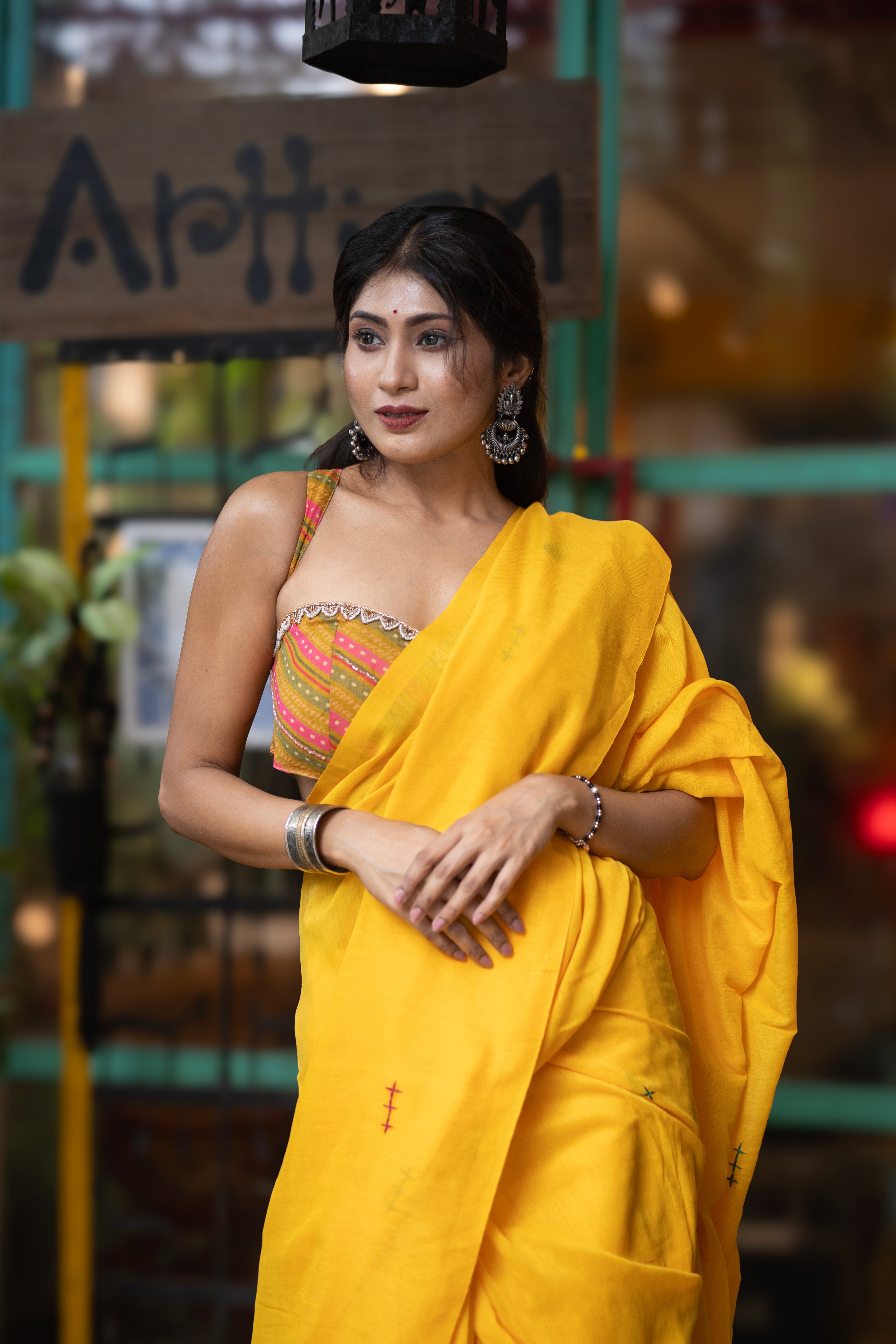 Yellow mul Cotton Saree with Mirror Work & Pompom Border