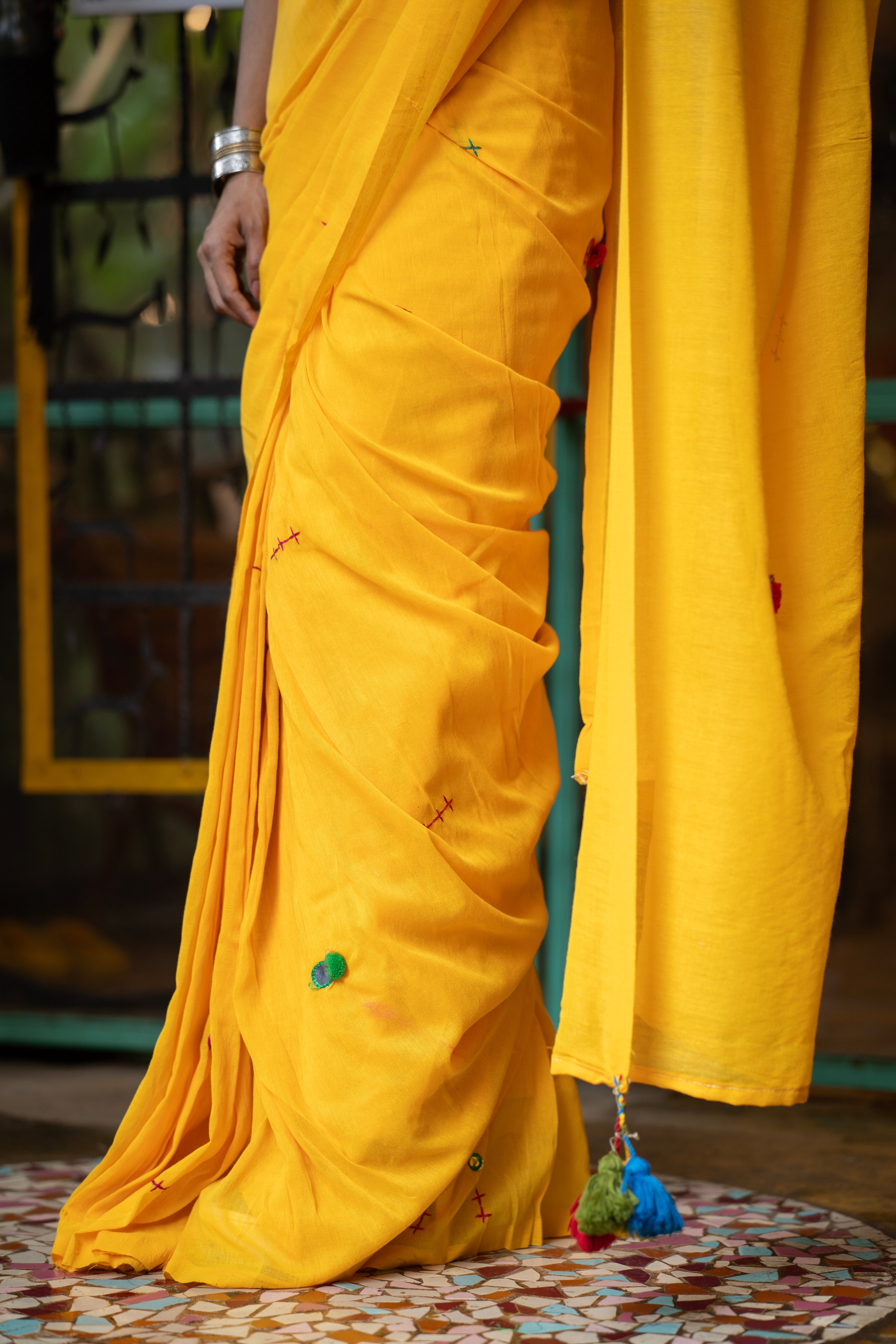 Yellow mul Cotton Saree with Mirror Work & Pompom Border
