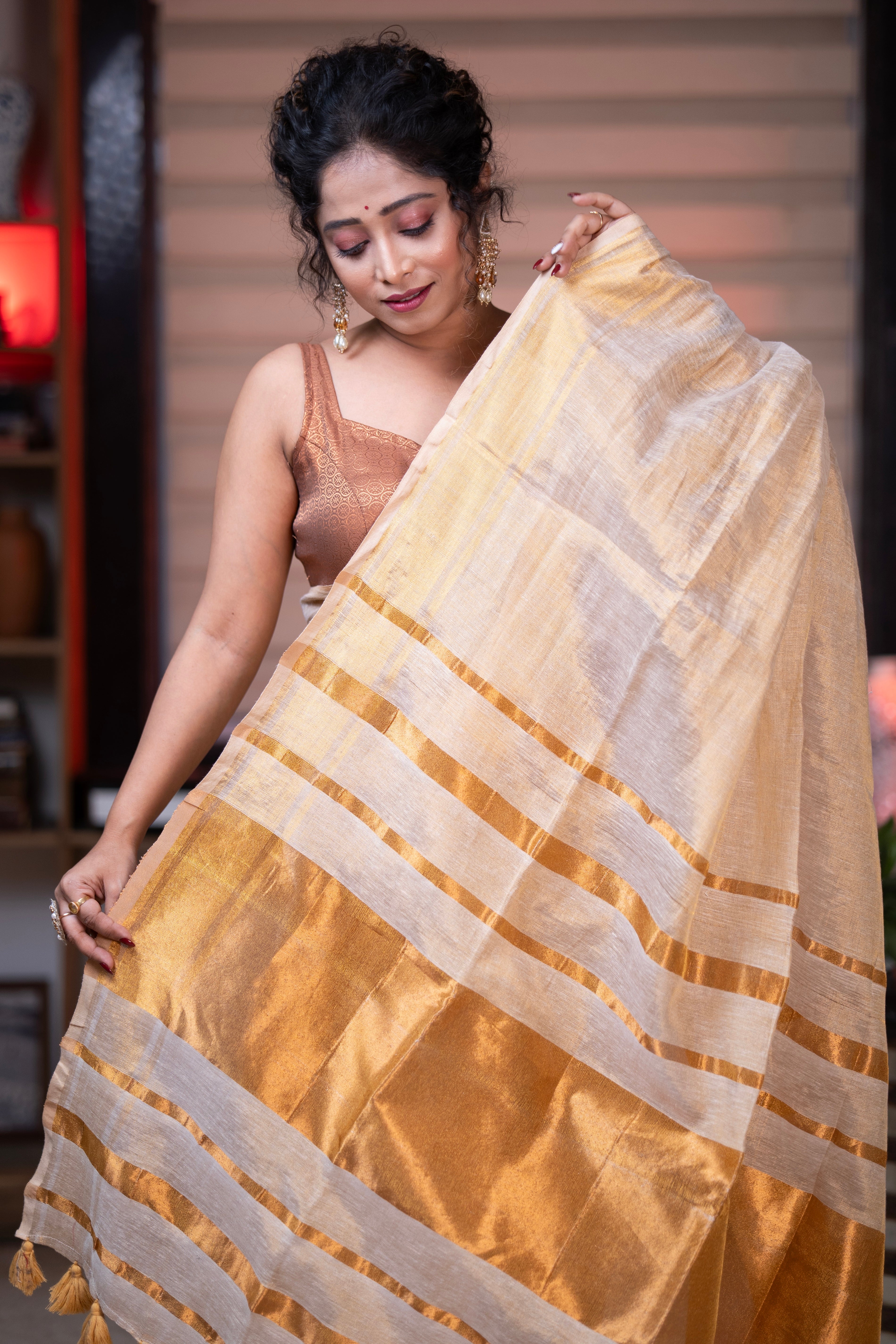 Golden dual tone pure tissue linen saree