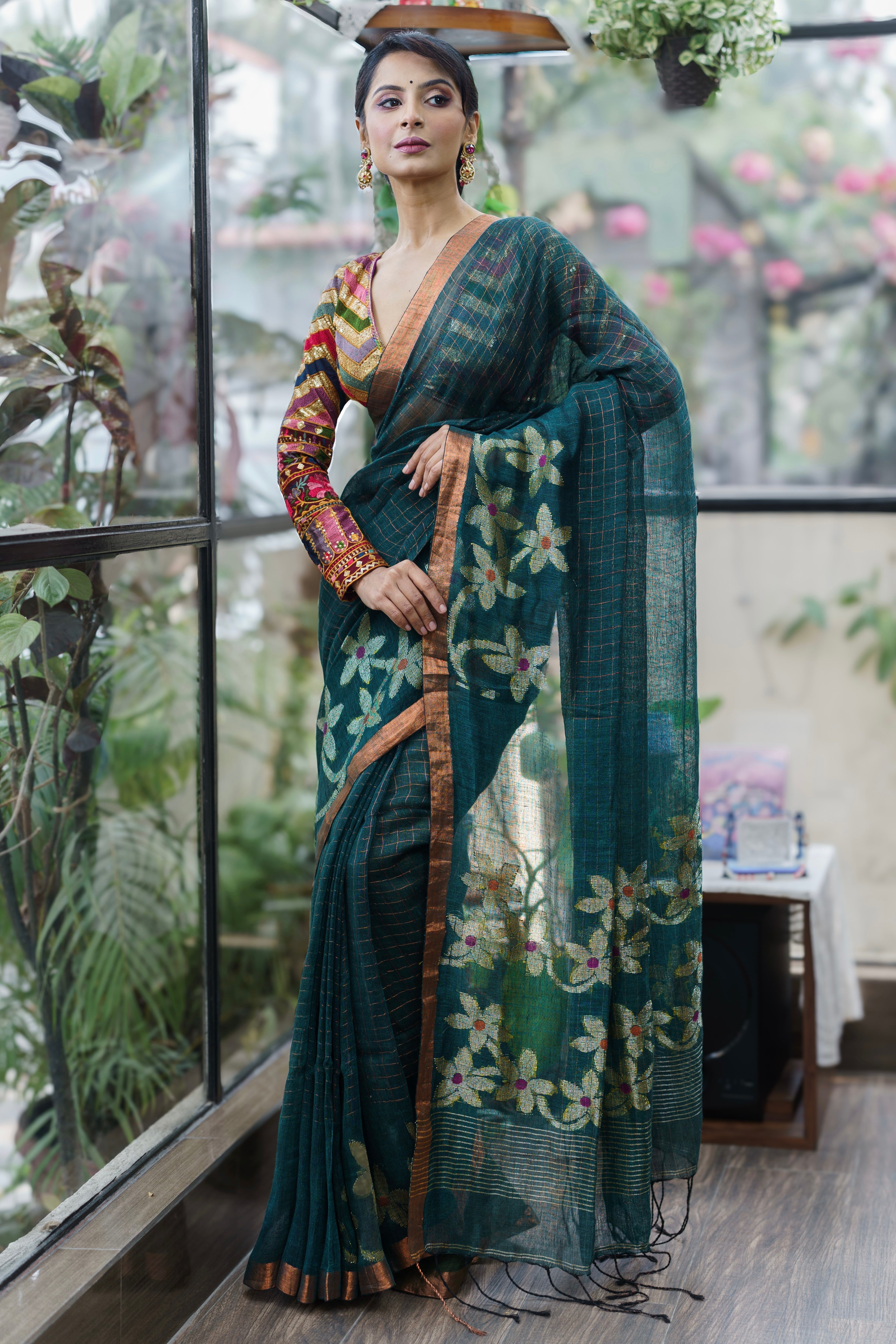 Forest Green Handwoven Linen Saree with Zari Checks & Floral Motifs