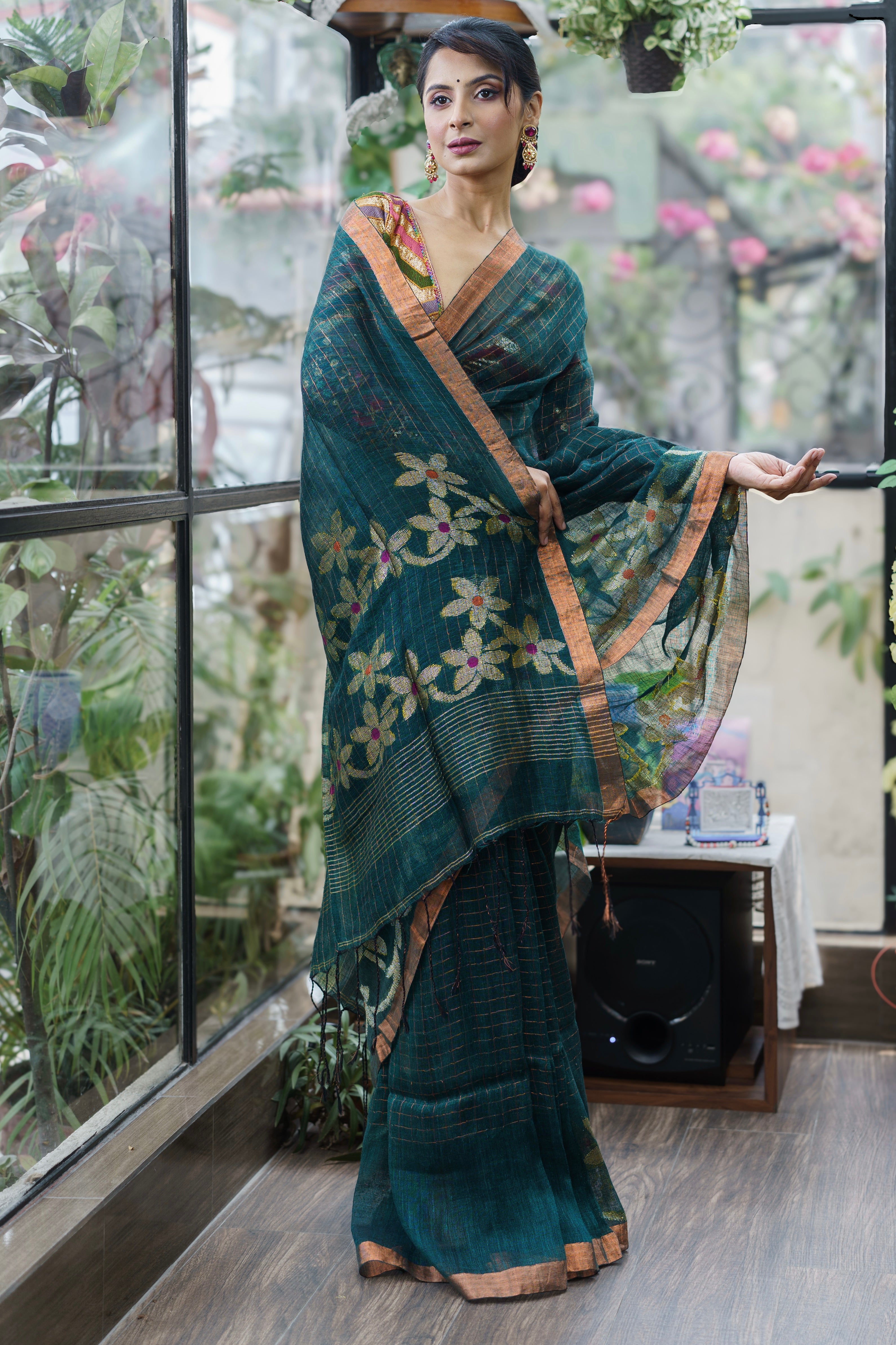 Forest Green Handwoven Linen Saree with Zari Checks & Floral Motifs