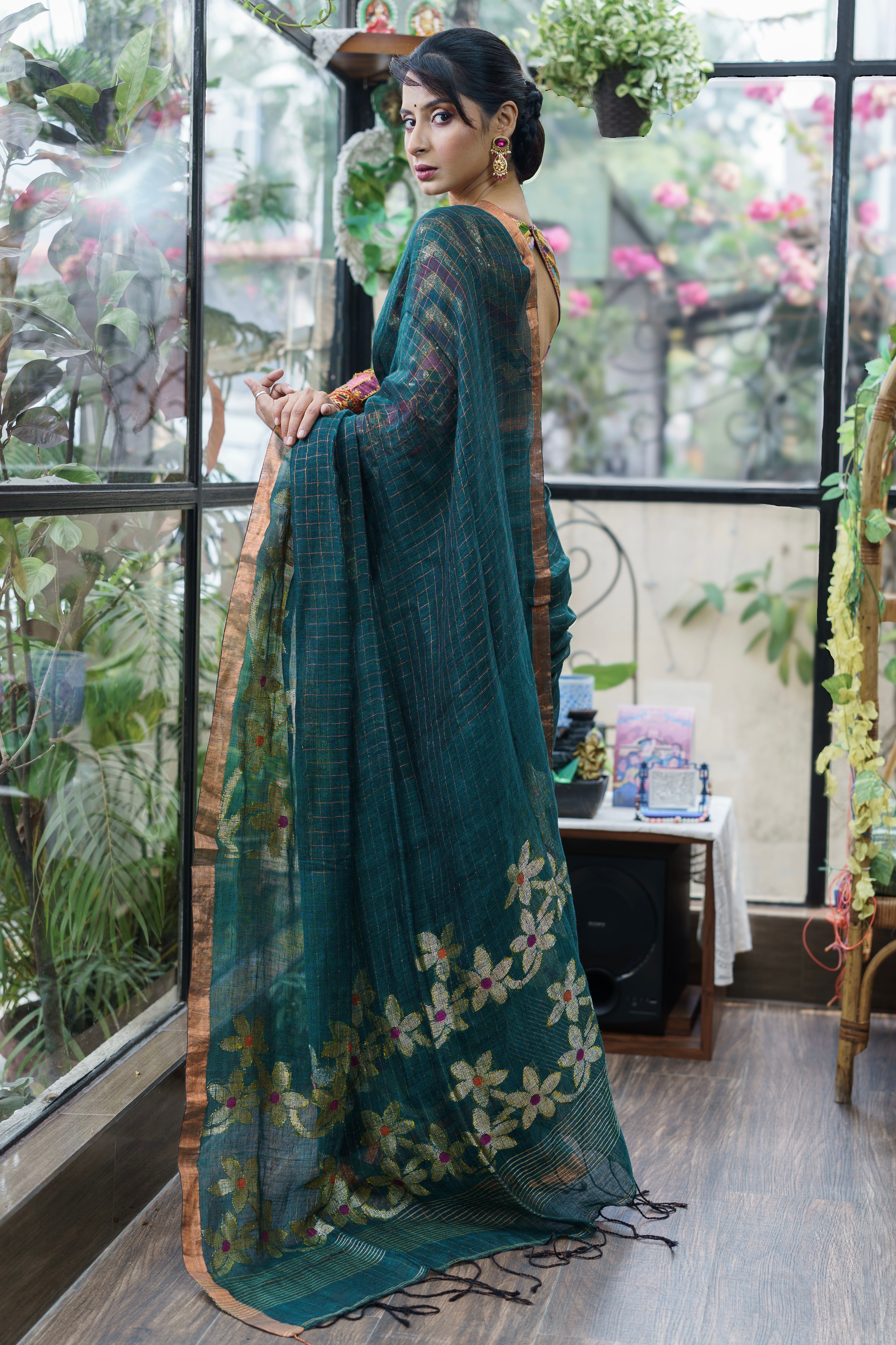 Forest Green Handwoven Linen Saree with Zari Checks & Floral Motifs
