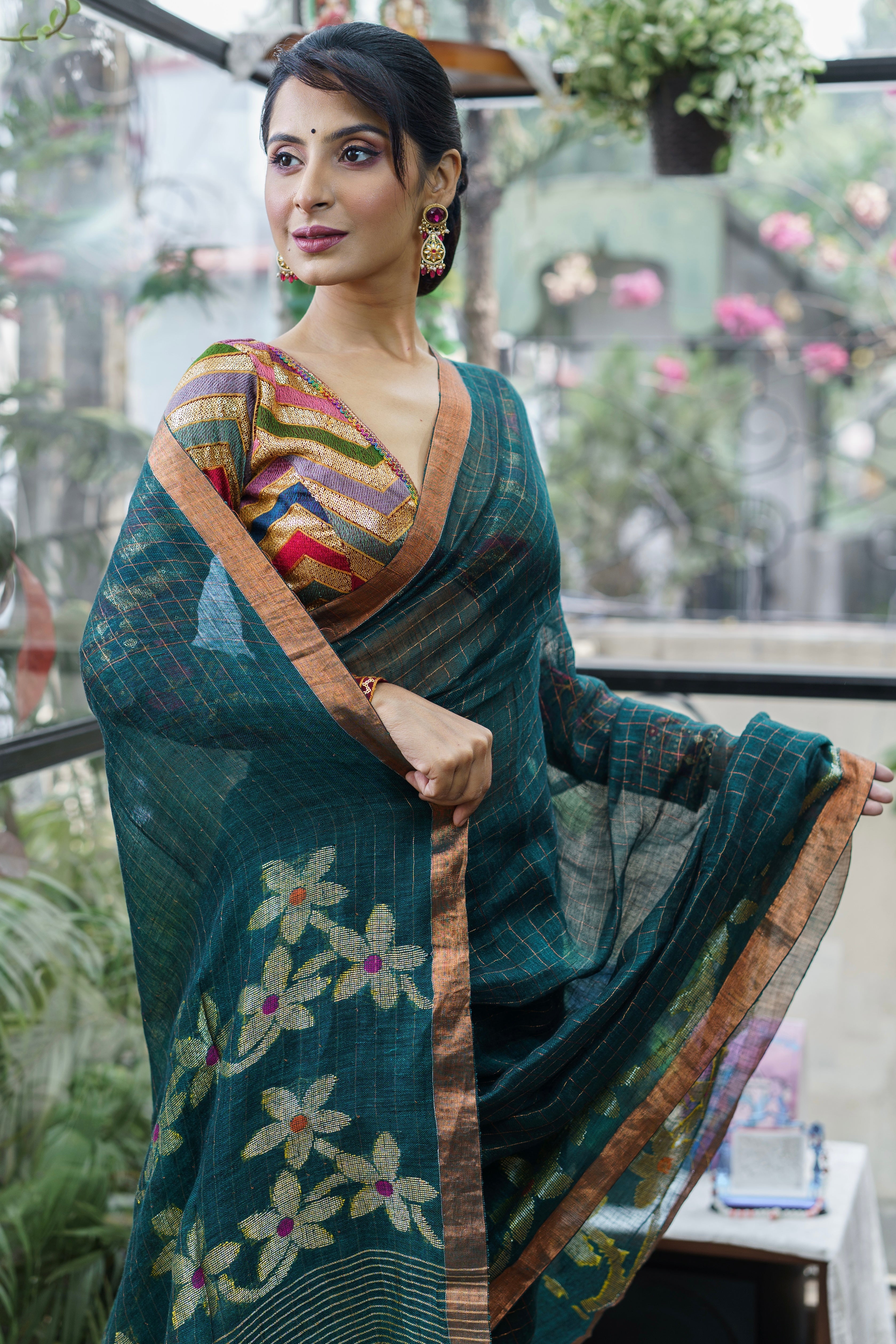 Forest Green Handwoven Linen Saree with Zari Checks & Floral Motifs