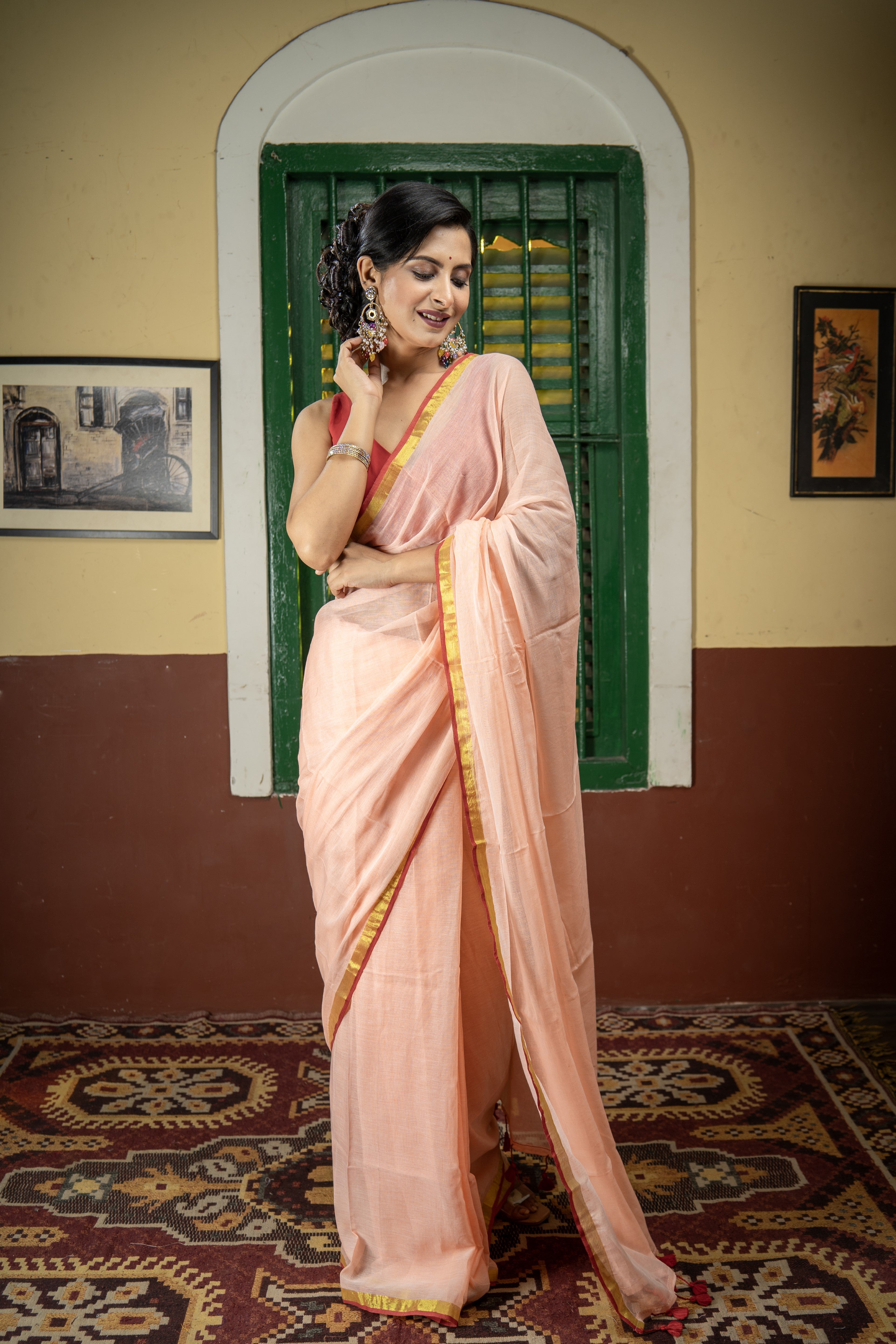Peach Mul Mul Cotton Saree With Red Golden Border