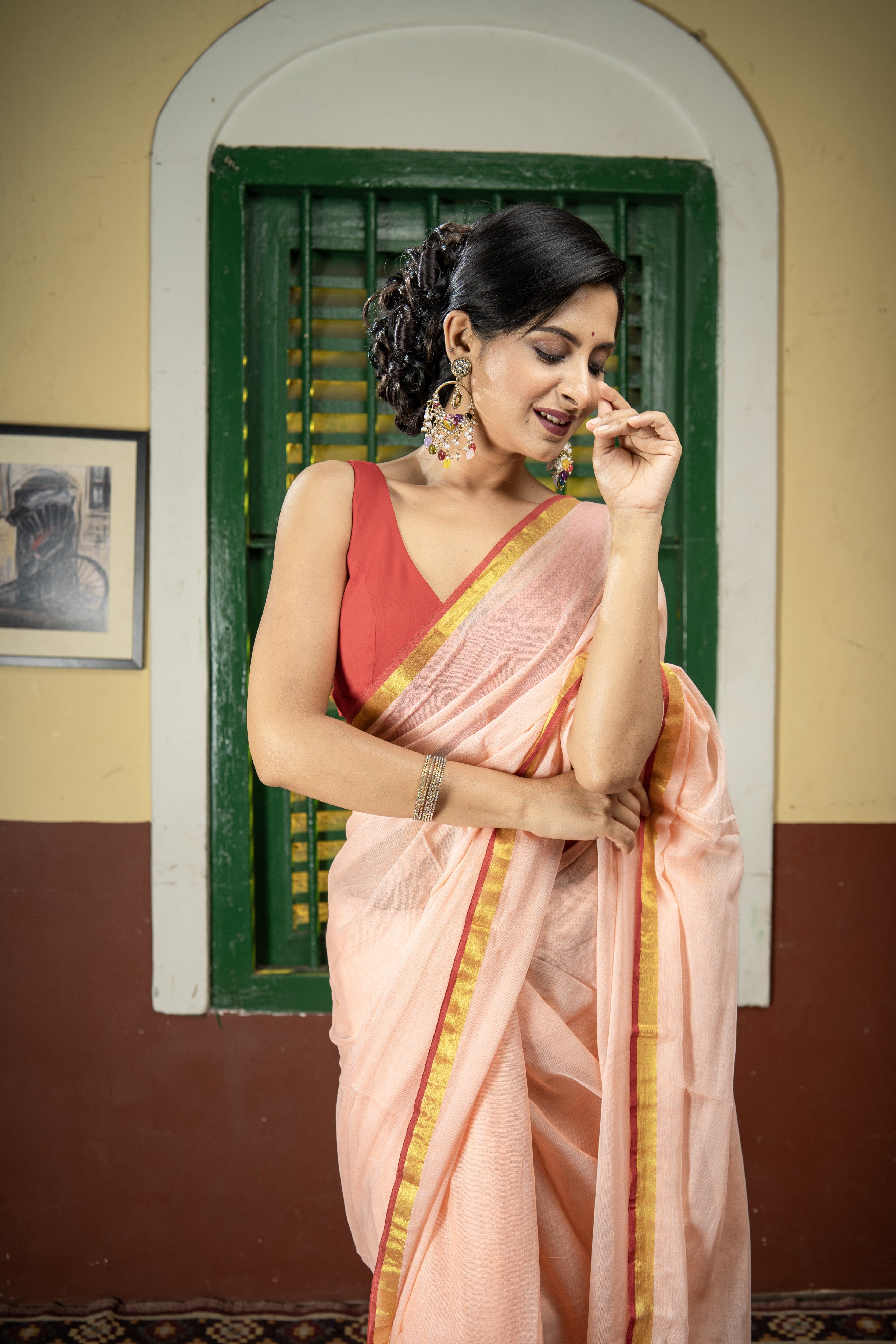 Peach Mul Mul Cotton Saree With Red Golden Border