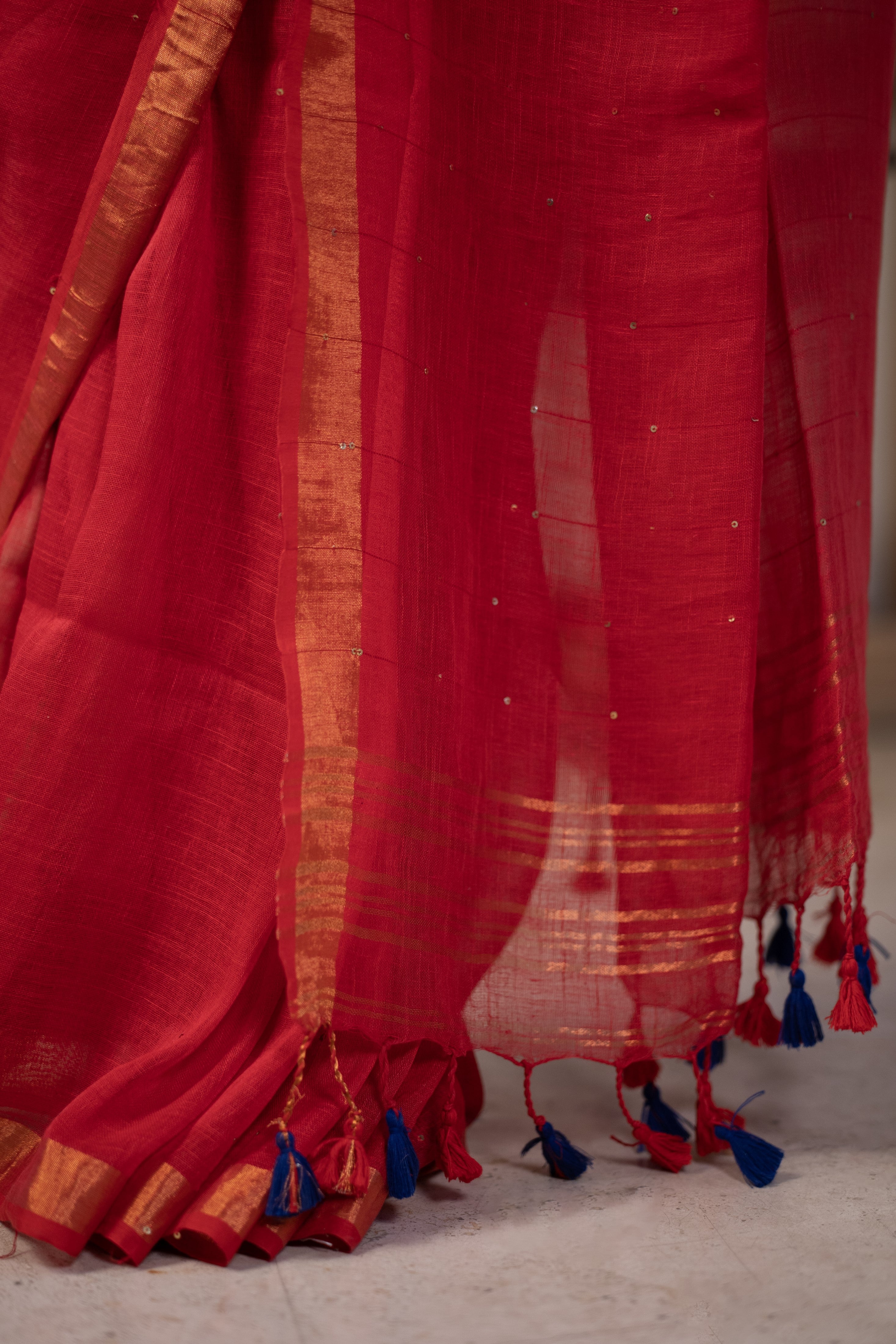 Red Sequence Work Linen Saree with golden zari border