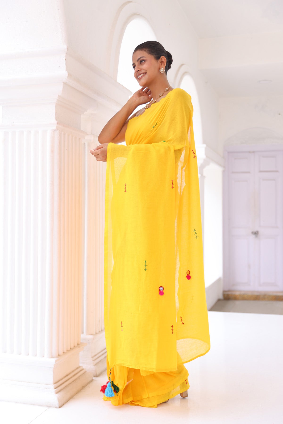 Yellow mul Cotton Saree with Mirror Work & Pompom Border